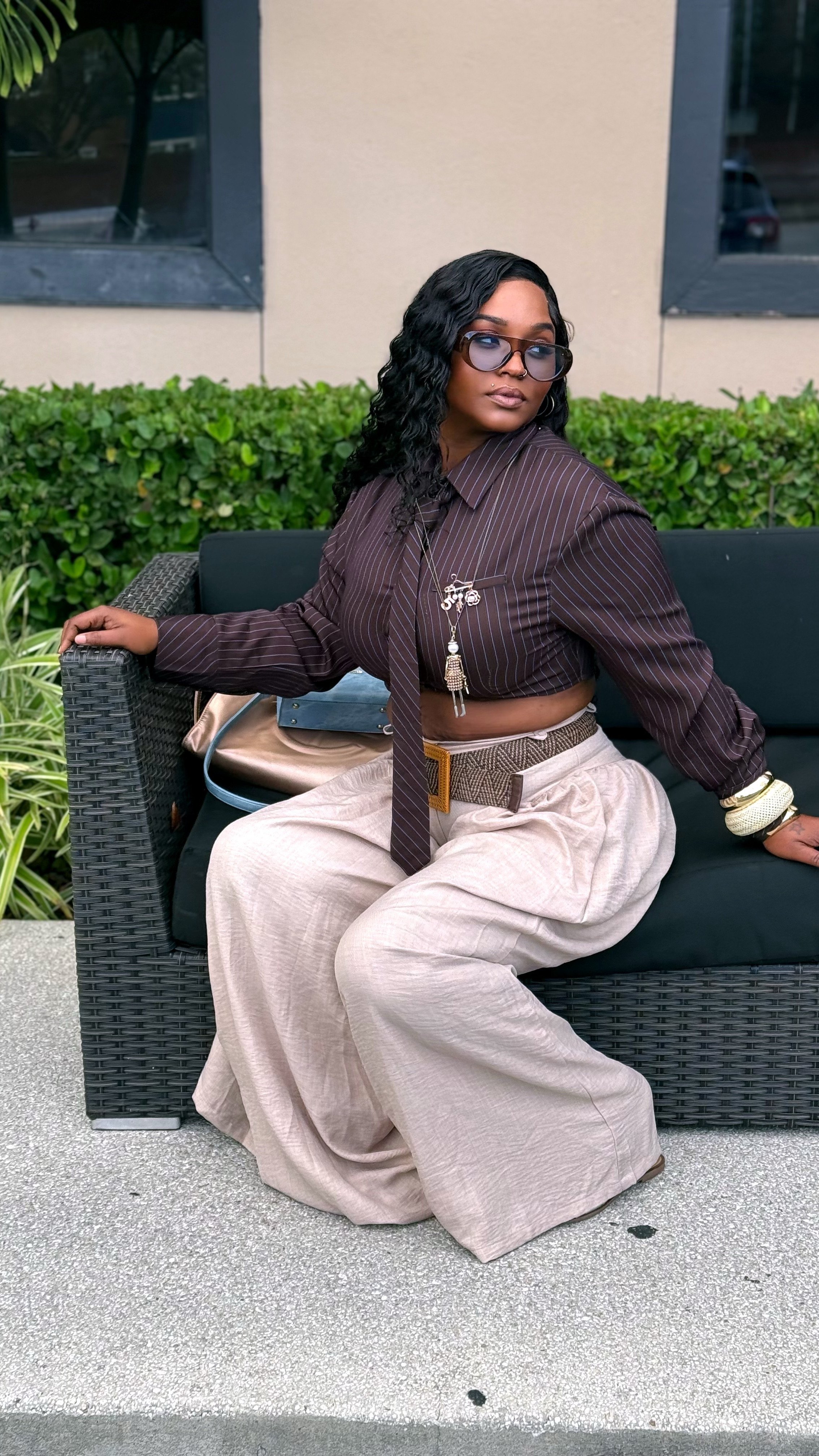 Yall HAVE to tell me what you think of this look?! 👀 

I am an outfit repeater and I love creating STATEMENTS with my clothes, it’s a vibe 😎 I’ll wear this again and again!! 

TYES STYLE TIP: Don’t be afraid to make new looks with your old pieces, that’s why we have closets, HELLO‼️🤧
.
OAN: Day Date w/ bae @q_33 she’s my photographer & videographer 🔥😍 cause nobody does it better 🤞🏾♥️

Earrings, Frames, belt & styled: @hausoftye_ #styledbytyet
Top & pants: Links 🔗 available in my story & LTK shop!! 
Wig provided by: @stylezbbyt 
Bags: @brandonblackwoodnyc @telfarglobal 
Style inspired by: @doechii 🔥

#LTKWatchNow #LTKStyleTip #LTKFindsUnder50