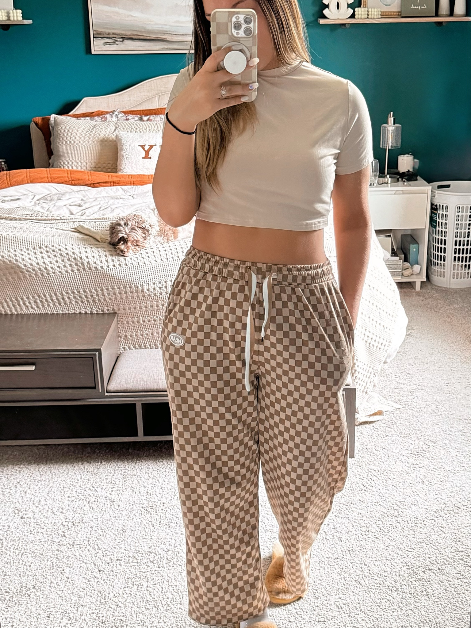Obsessed with comfy loungewear that transitions seamlessly to errands or a casual coffee date?  Same! This look is for you, girl 💋

Details (I’m 5’6” & 158lbs)
Crop top: Amazon size large 
Checkered pants: Amazon size large
Slippers: Amazon O/S
Phone case: Amazon Casely classic checkered version

Here's why you'll love it:

Comfy Chic: The checkered lounge pants provide ultimate comfort while still looking stylish.
Matching Magic: The coordinating phone case adds a playful touch and makes for the perfect selfie. 📸
Effortless Style: Throw on a crop top and sneakers for a complete outfit that's both comfy and put-together.
Versatility: Perfect for lounging at home, running errands, or relaxed outings.

Get Inspired:

Play with textures! Pair your checkered pants with a soft knit sweater or a flowy tank top.
Accessorize! Add a statement necklace or layered bracelets for a touch of personality.
Don't forget the slippers (or cute sneakers) to complete the cozy vibe!

Stay cozy & follow me to get updates whenever I post something new 🫶🏼

 #checkered #loungewear #phonecase #matchingset #comfychic #homewear #errandsoutfit #casualstyle #ootd #shoppablefeed #springoutfit #casualoutfit

#LTKmidsize #LTKfindsunder50 #LTKstyletip