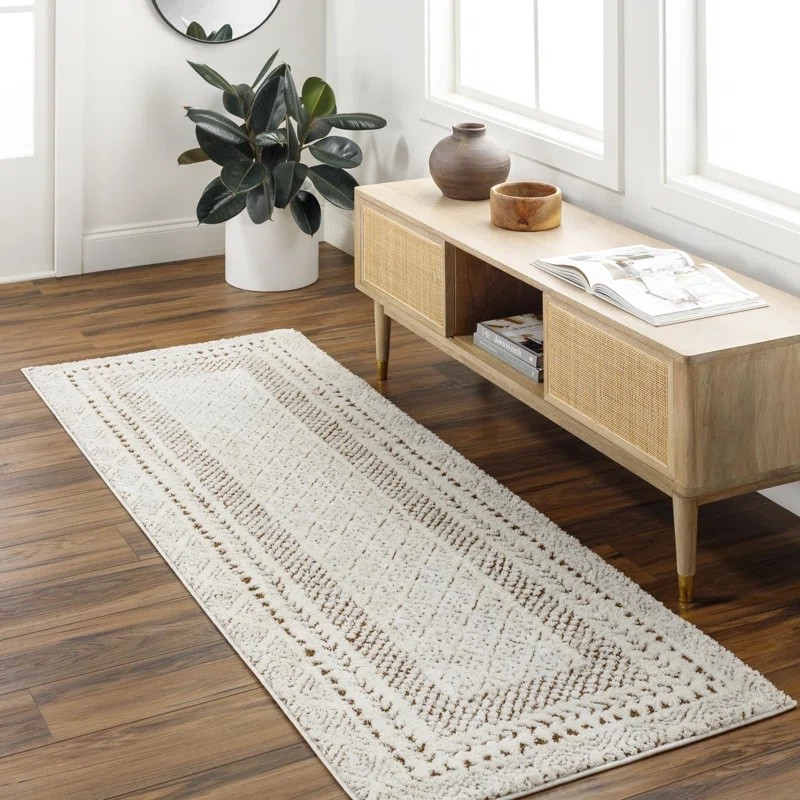 This Calvo machine woven oriental area rug is such a great neutral foundation piece. The soft ivory and brown tones with subtle medallion detailing add texture without overwhelming the space. It works beautifully in an entryway, hallway, or layered in a living room with warm wood floors and a cane media console. Such an easy way to add cozy character on a budget.

#LTKSaleAlert #LTKHome