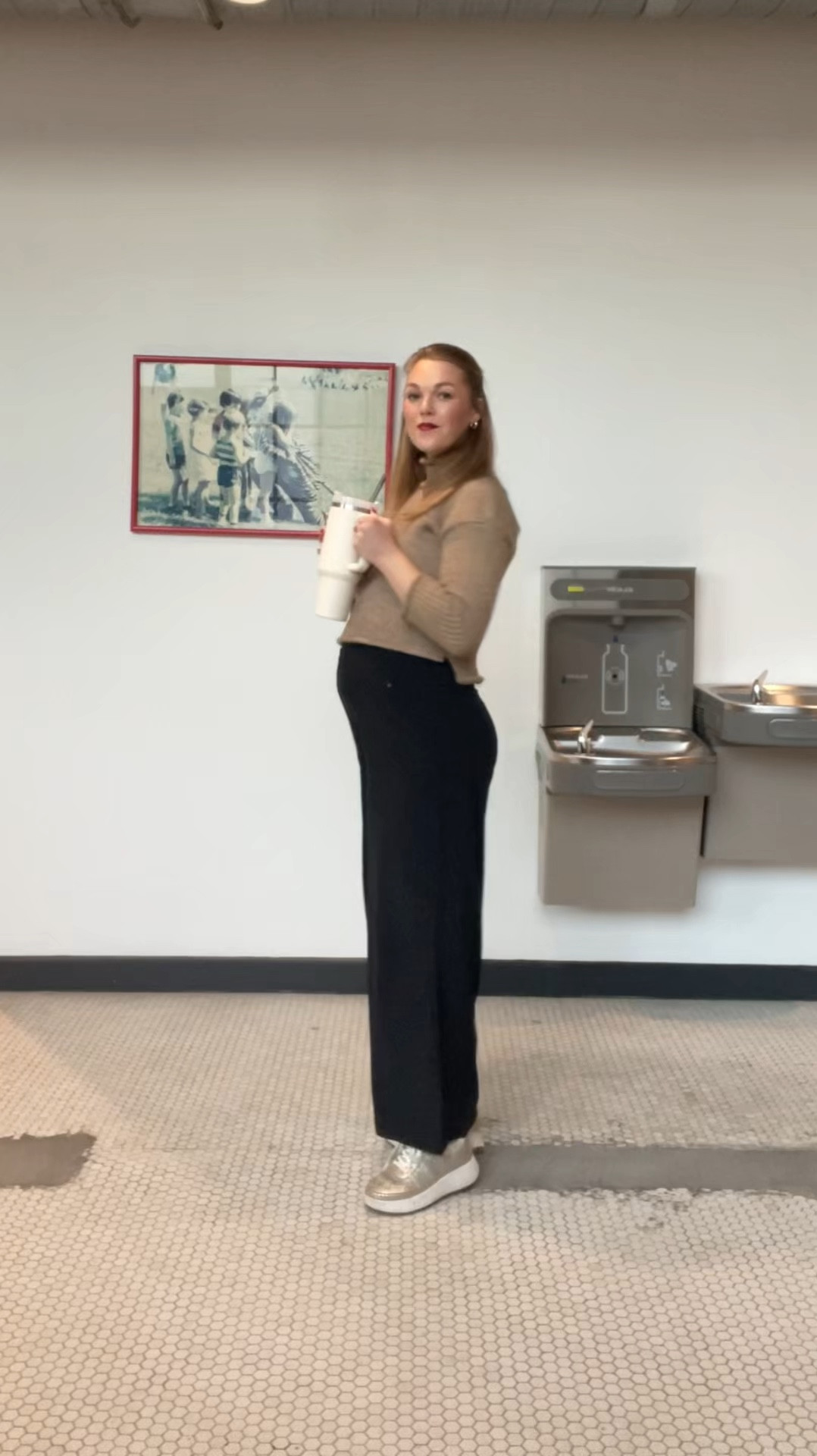 Water and ootd break. Workwear. Cozy maternity style. Professional stretchy pants. Black Lululemon trousers. Tan turtleneck sweater. Gold sneakers  

#LTKBump #LTKStyleTip #LTKWorkwear