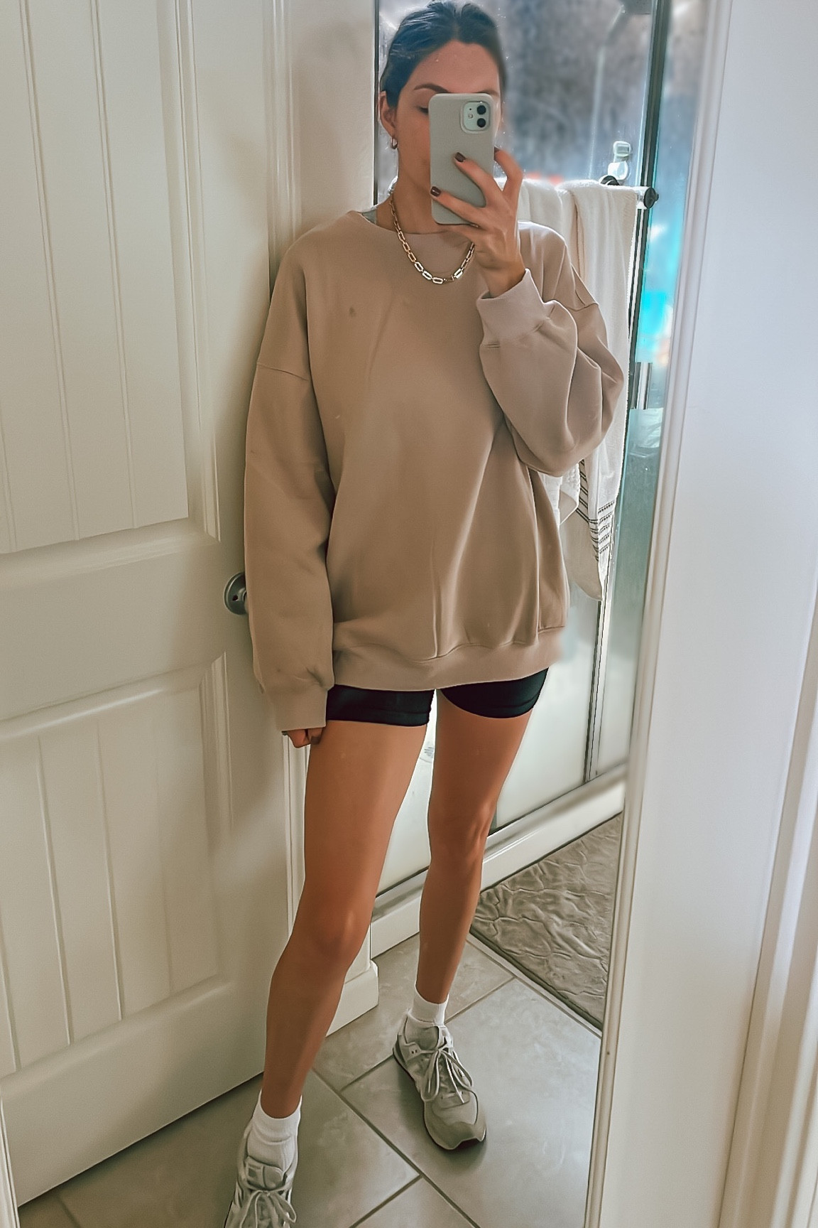Athleisure outfit, casual outfit, oversized crewneck, biker shorts