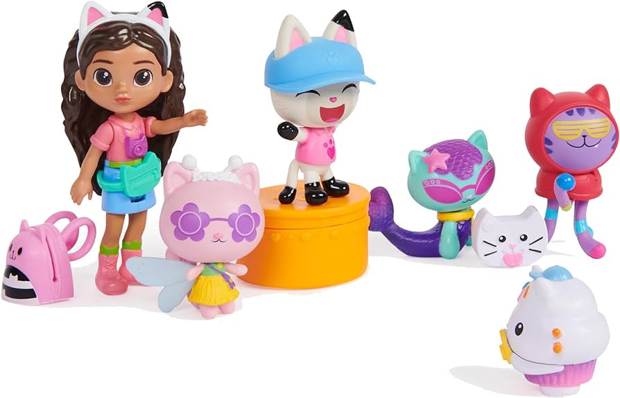 Gabby's Dollhouse, Travel Themed Figure Set with a Gabby Doll, 5 Cat Toy Figures, Surprise Toys &... | Amazon (US)