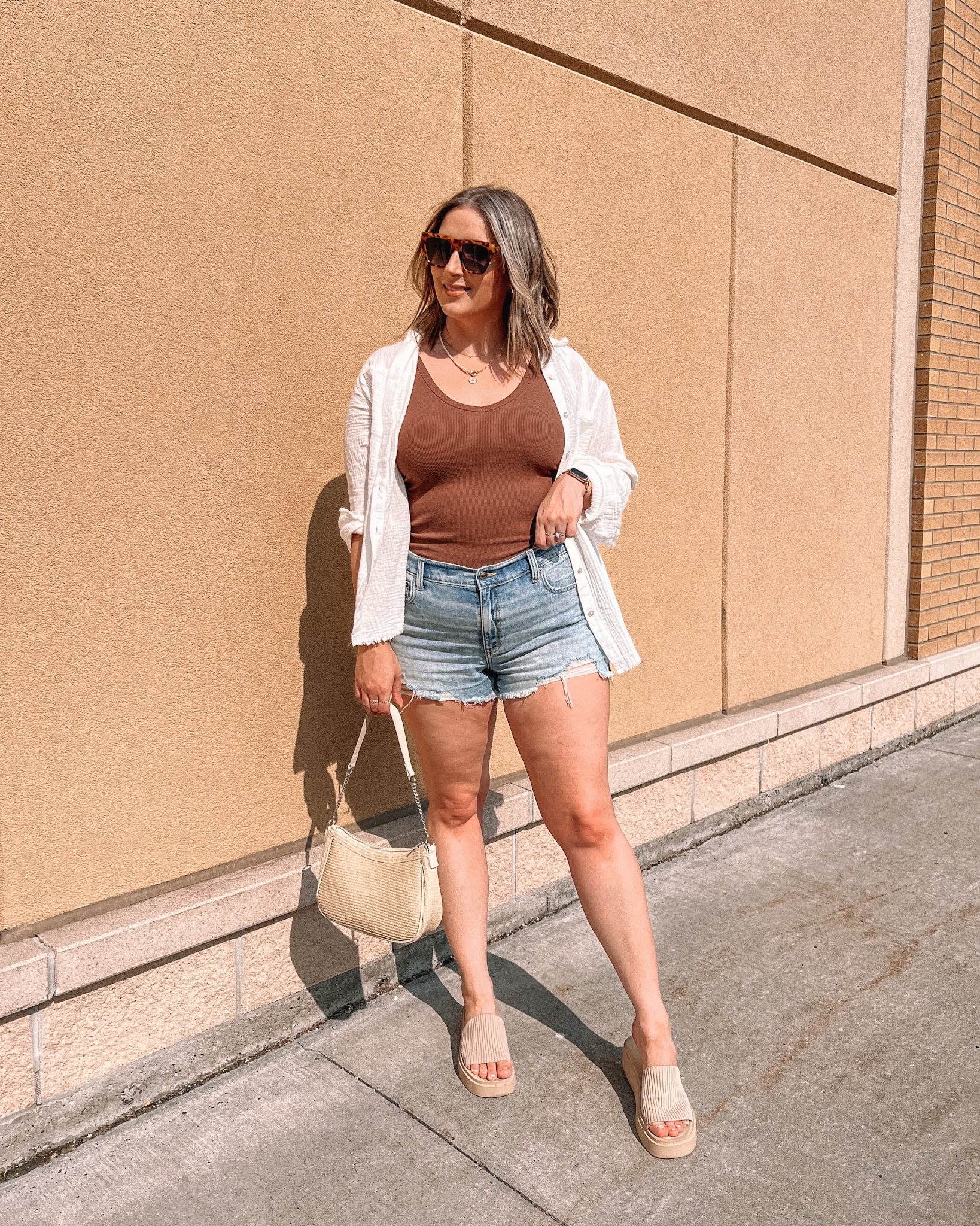 Casual neutral summer outfit - brown tank top, the comfiest denim shorts (30% off!), white button up shirt, Amazon platform sandals

Midsize fashion, summer outfits, summer 2023 trends


#LTKsalealert #LTKunder50 #LTKSeasonal