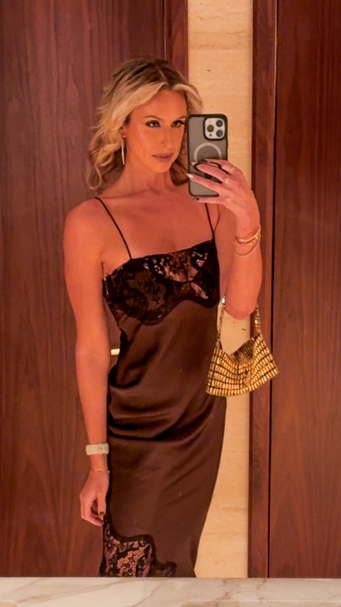 Loving the look of this satin slip dress. 
A simple brown dress is perfect for this winter. 

#LTKootd #LTKFindsUnder50 #LTKHoliday