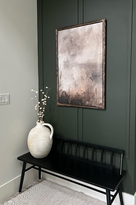 Love having this one dark wall in the entryway. It’s just enough of a ‘mood’ for me! 
Paint color is SW ripe olive in velvet finish. Gorgeous paint! 
Moody wall inspiration 