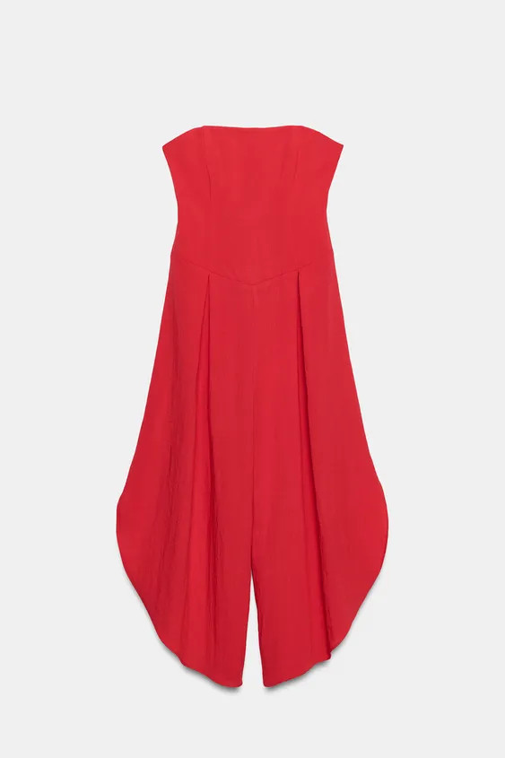 Straight-neck, off-the-shoulder jumpsuit. Wide leg with an asymmetrical hem. Elasticated smocked ... | Zara US