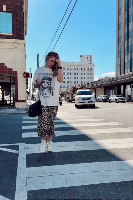 graphic tee + leopard 🐆 #leopardprint #animalprint #graphictee #bandtee

#LTKfindsunder50