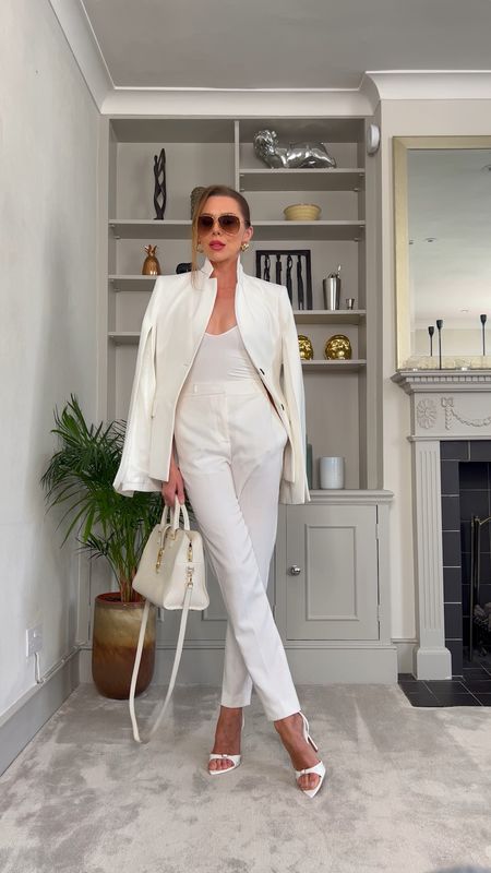 - white blazer
- white bodysuit
- white suit trousers

Use code LAURAB20 for 20% off at Karen Millen (partner)

#LTKSeasonal #LTKstyletip #LTKworkwear