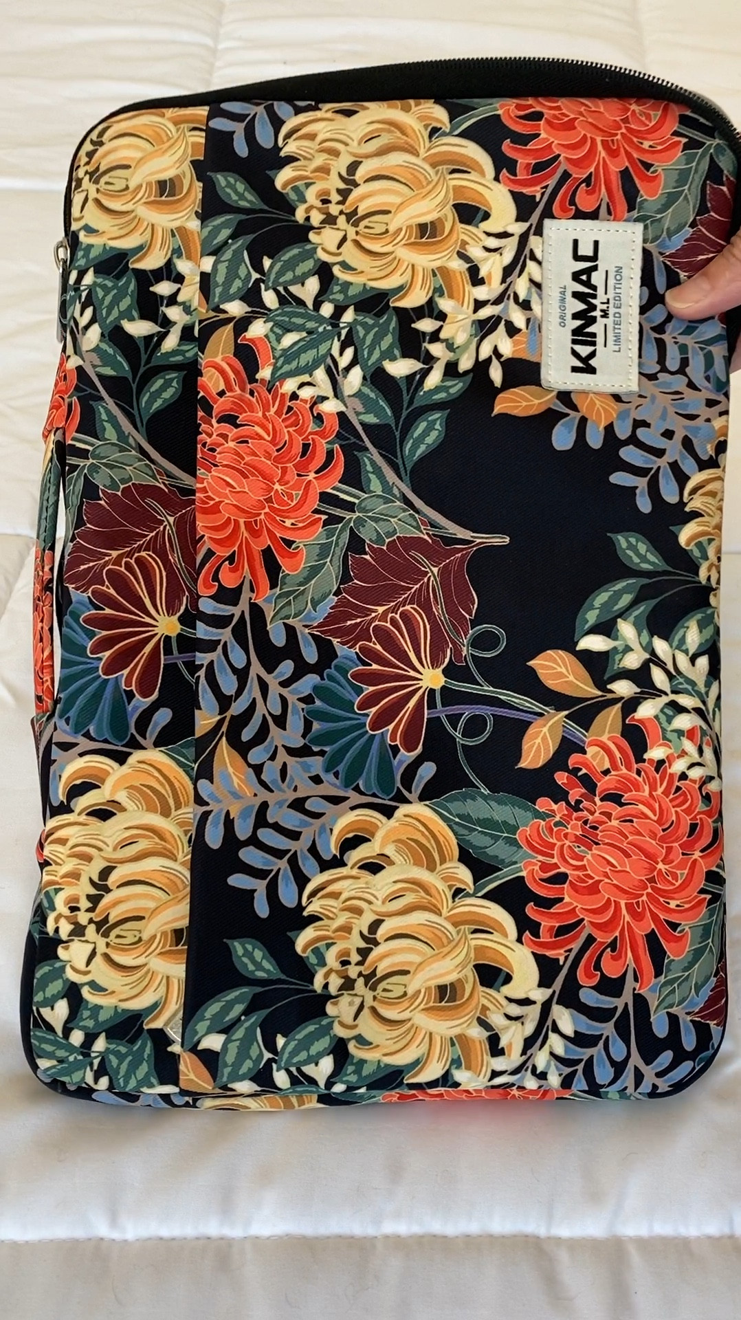 I love this water-resistant and shockproof laptop case. Carry it under your arm or use the small handle that tucks away easily. It has an outside pocket with different compartments for charging cables and other small accessories or items you need to carry with you!  The inside is soft and plush. My favorite laptop sleeve yet!

#LTKStyleTip #LTKTravel #LTKWorkwear