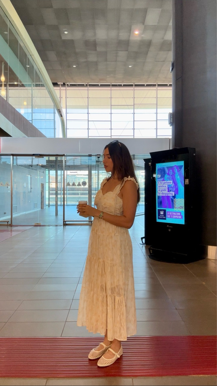 There were so many sunflowers out there that matched my pastel outfit of the day for a day trip to the Italian countryside! 🌻

Dress - @thevivienne.clothing 
Shoes - @dsw 
Bag - @gedheleatherbali 
Earrings - @didierdubot_official 
Sunglasses - Gucci 
Rings - @ouraring Cartier & @andotherstories 
Watch - @larssonjennings Bracelets - @Swarovski & @vancleefarpels 

#OOTD #classystyle #travelfashion #italy #dsw #highlowfashion #fashion