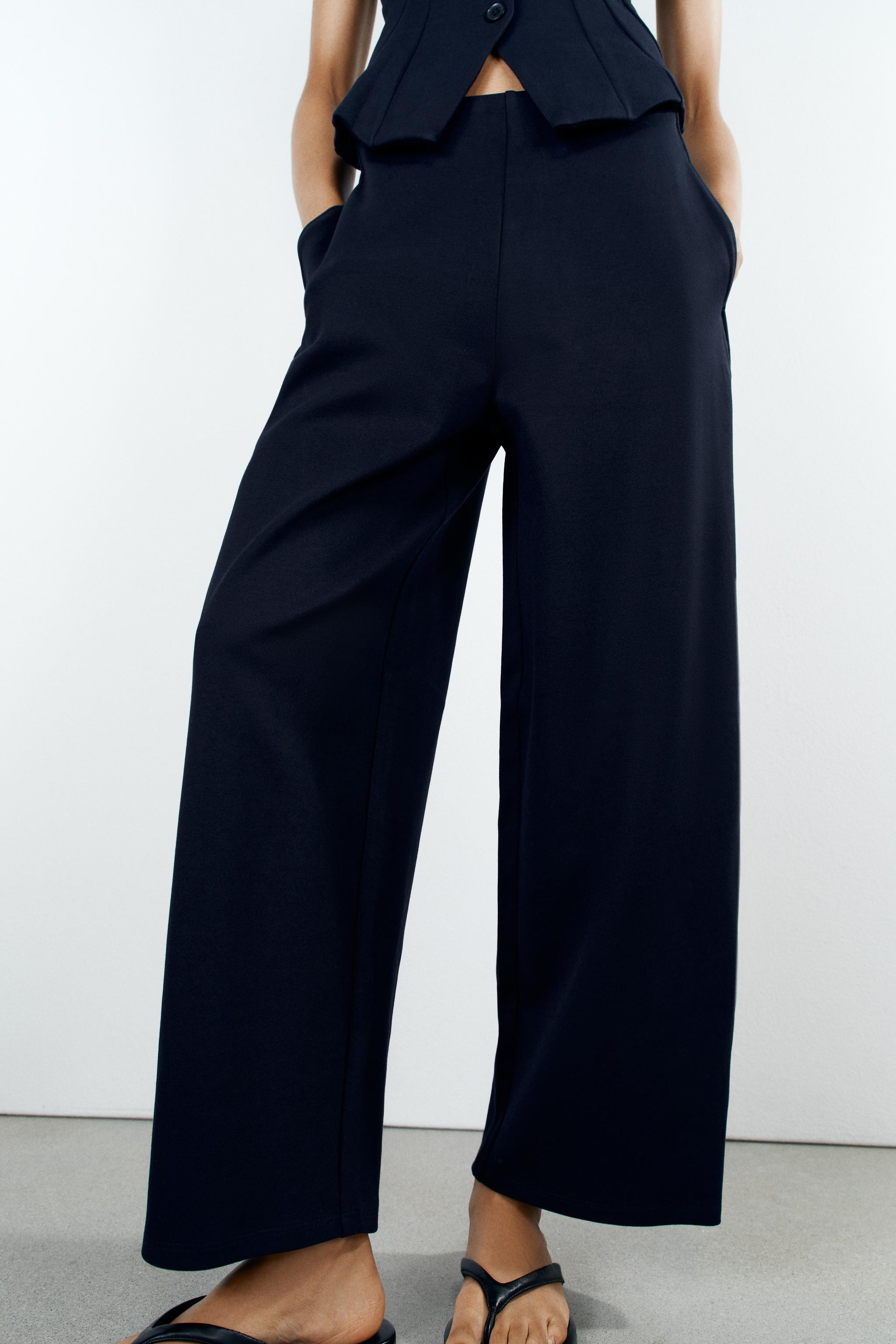 Pants crafted from stretchy, flexible knit fabric with a compact, plush, and opaque texture. Mid-... | Zara US