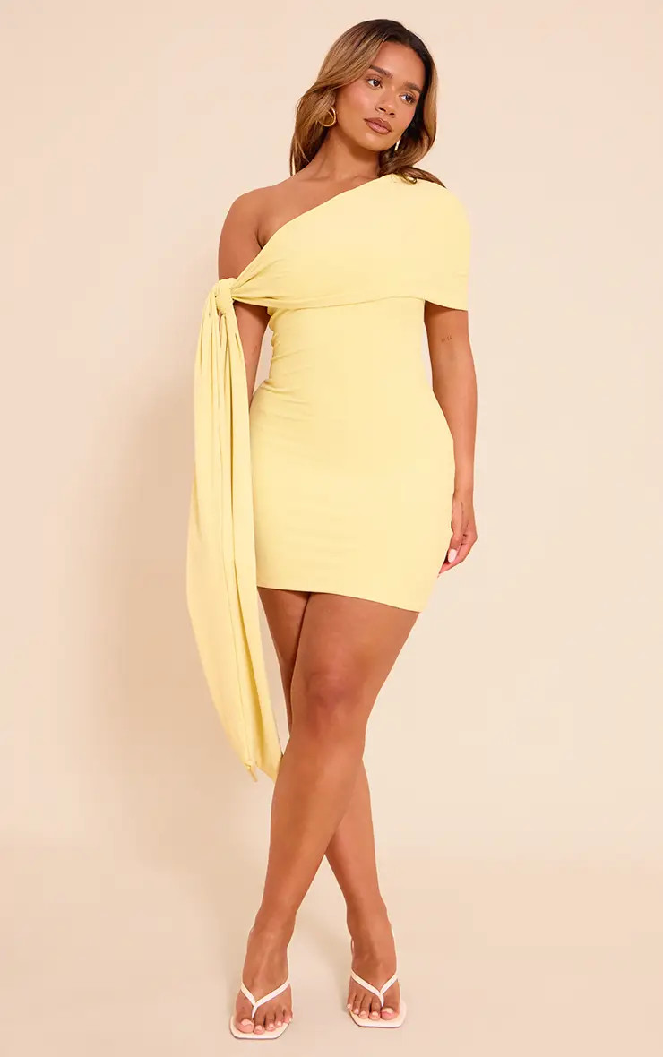 Pale Yellow Shape Butter Cream Soft Touch Fold Over Asymetrical Tie Side Mini Dress | PrettyLittl... | PrettyLittleThing US
