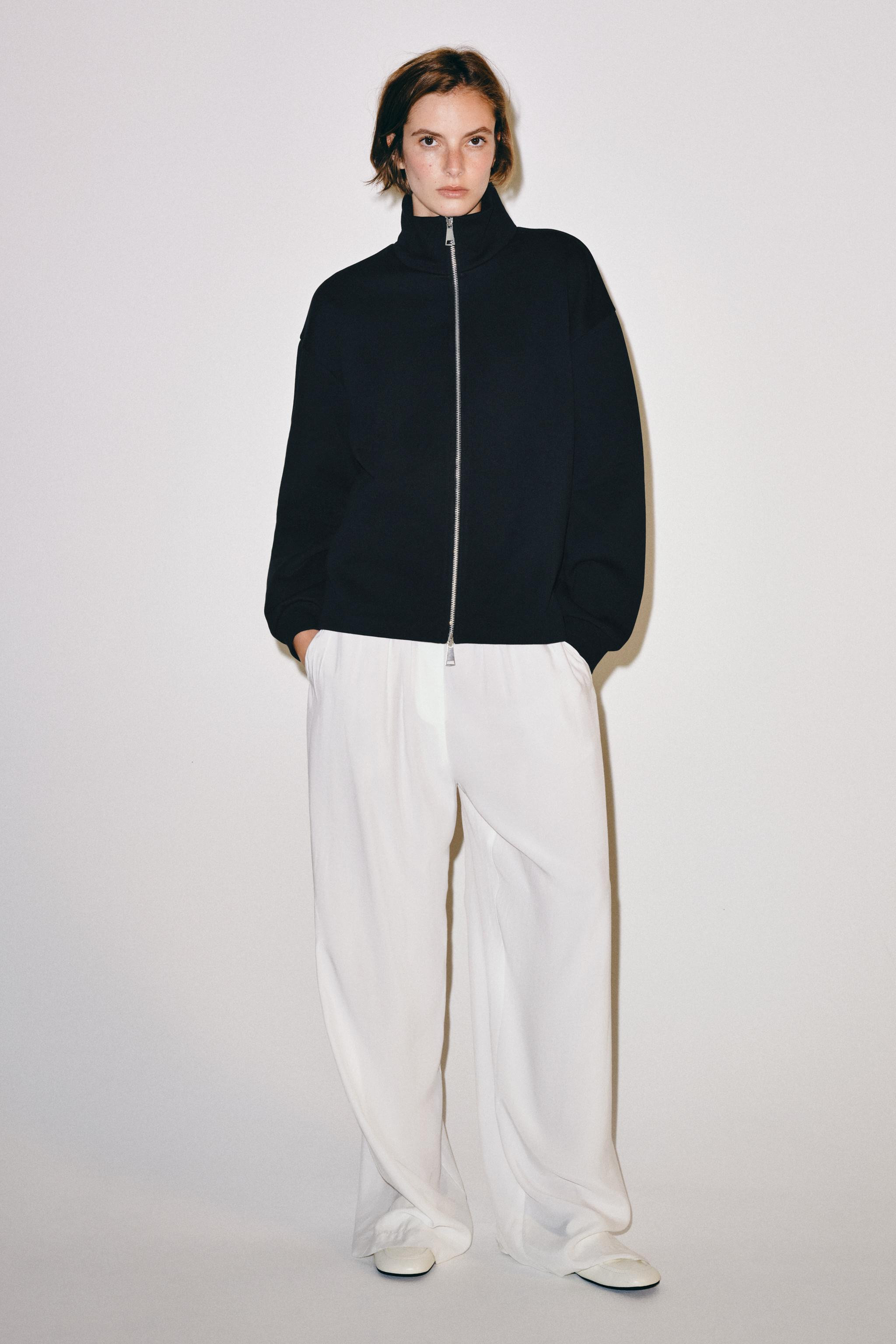 Sweatshirt made from a cotton-blend fabric. High neck with long sleeves and cuffs. Front zip fast... | Zara US