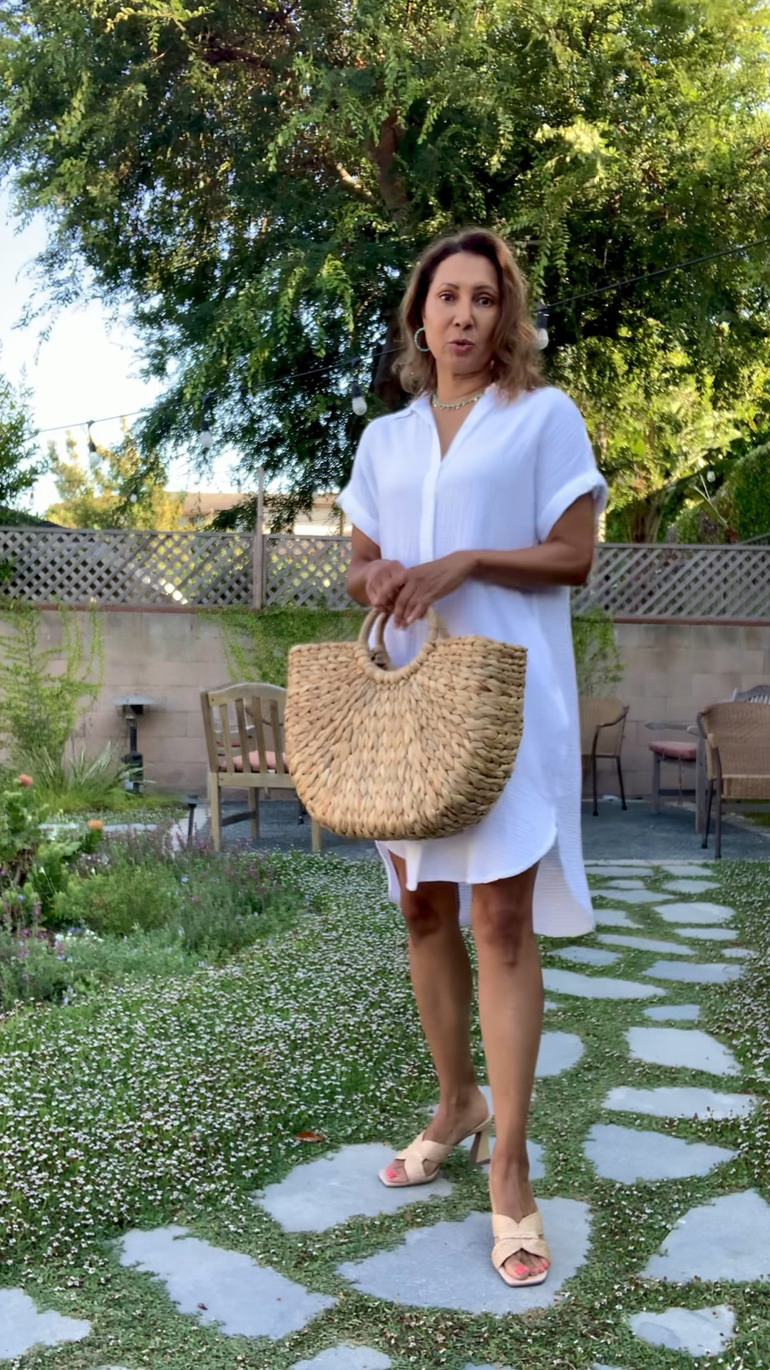 My casual white dress is a cute vacation outfit idea. Style with a straw bag and raffia sandals.

#LTKover40
#LTKTravel
#LTKStyleTip
#LTKFindsUnder50

#LTKVideo #LTKSummerSales #LTKSeasonal