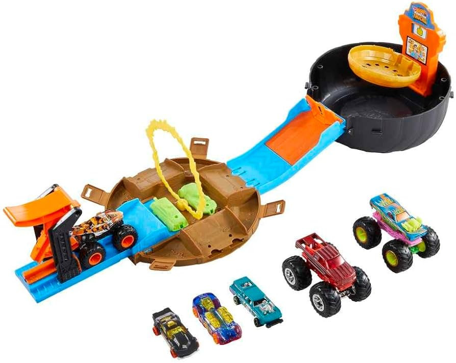 Hot Wheels Toy Monster Trucks Playset, Tire-Shaped Case Transforms into Race Course, 3 Trucks & 4... | Amazon (US)