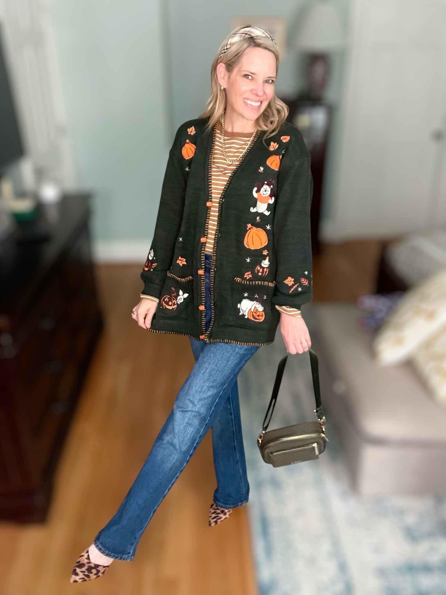 🍂✨ Halloween chic meets cozy everyday style! I layered this Disney Winnie the Pooh Halloween cardigan 🎃🐻 from Hot Topic over a striped long sleeve tee for the perfect playful fall look. Paired with my straight-leg jeans 👖 from Walmart, a sleek Kedzie crossbody bag, and leopard print pointed-toe pumps 🐆 from Sam Edelman, this outfit is equal parts festive and elevated. I finished it off with my favorite gold layered necklaces + bracelets ✨ for that extra polish.

Whether you’re heading to a pumpkin patch, casual Friday at work, or trick-or-treating with the kids, this outfit is comfy, cute, and on-theme without being over the top.

🛍 Linked exact pieces + budget-friendly alternatives so you can shop the look and recreate this fun fall vibe!

⸻


Halloween cardigan, fall outfit inspiration, Disney Winnie the Pooh sweater, leopard print pumps, cozy fall fashion, pumpkin patch outfit, casual fall style, affordable Walmart jeans, layering outfit ideas, gold jewelry stack


#LTKFindsUnder50 #LTKFindsUnder100 #LTKOver40