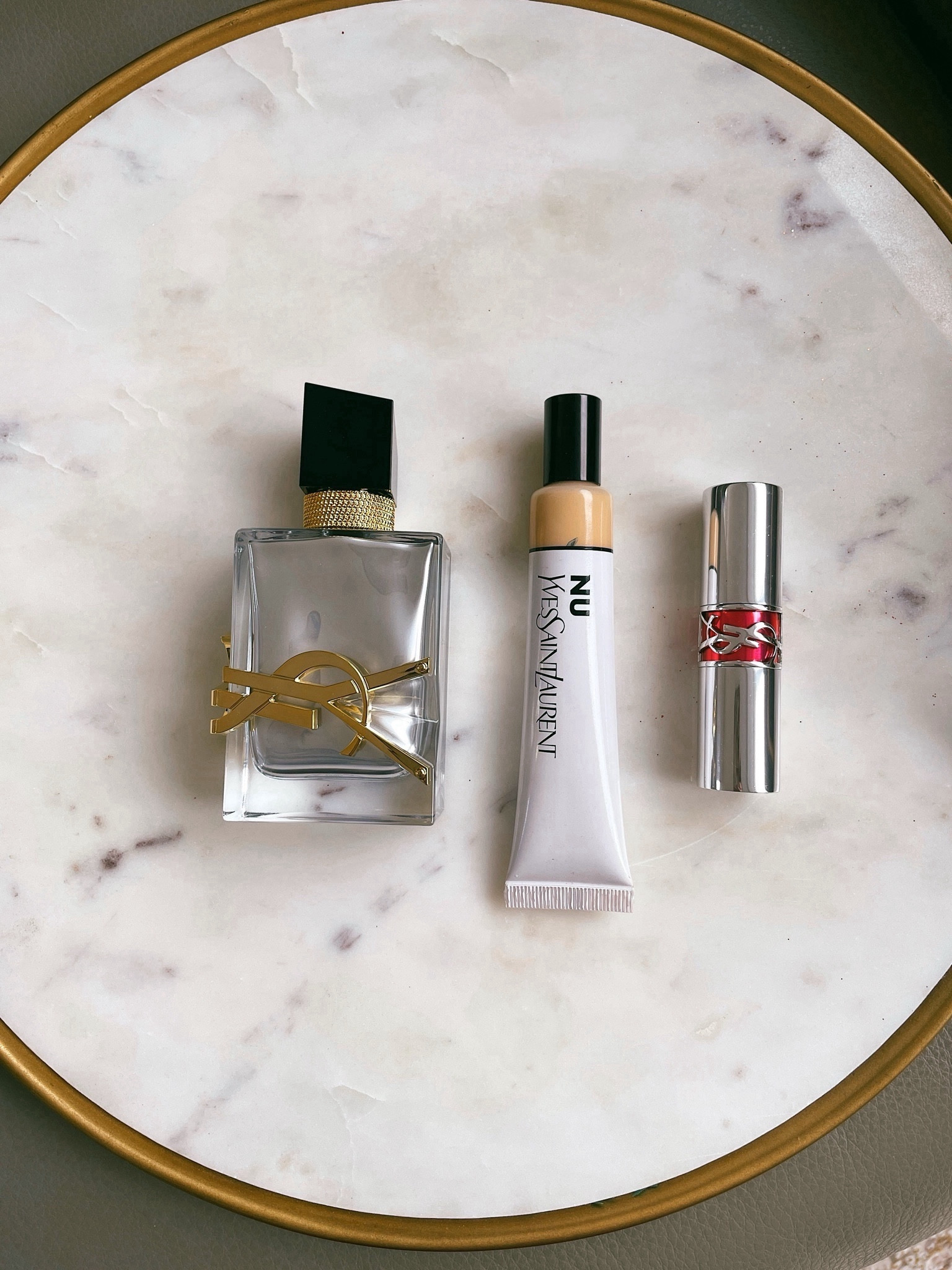 YSL bare look tint hydrating foundation is very lightweight, I wear shade NU 1.
Lipstick shade 14. Perfume YSL Libre.

#LTKHoliday #LTKbeauty