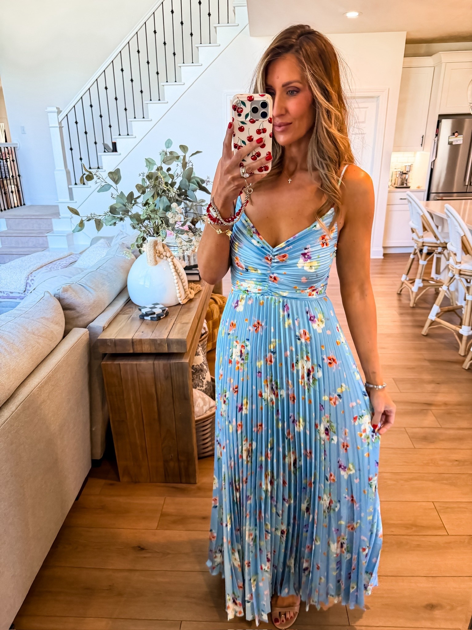 This blue floral maxi dress is such a beautiful spring and summer outfit, lightweight with a flattering fit and flowy pleated skirt that moves so nicely. Perfect for weddings, baby showers, vacations, or any dressy occasion where you want something feminine and effortless.

blue floral dress, maxi dress outfit, spring dress, summer wedding guest dress, floral maxi dress, pleated dress, feminine style, vacation outfit, dressy casual outfit, themominstyle

#LTKootd #LTKSeasonal #LTKWedding