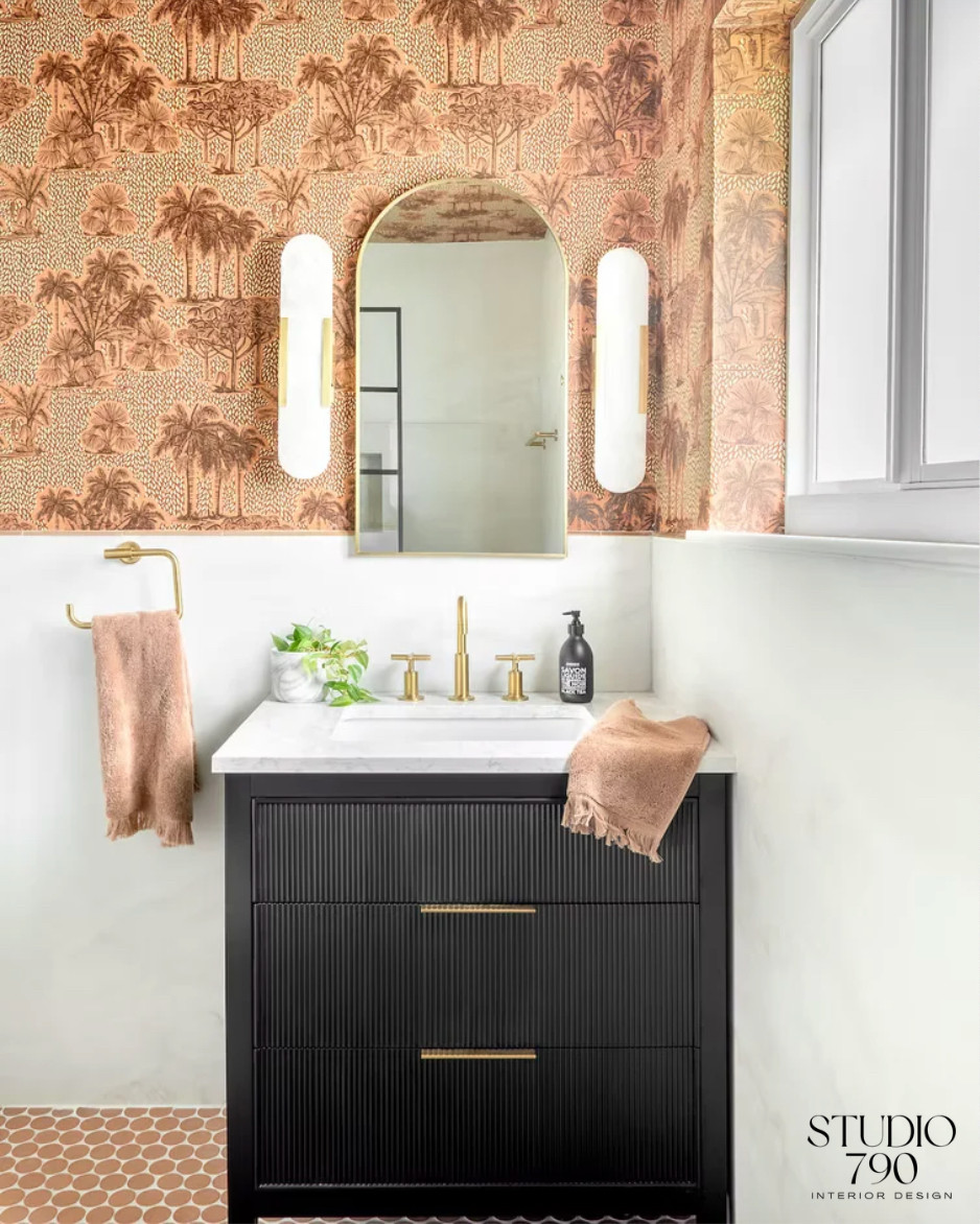 Bold pattern, warm brass, and a sleek black vanity make this bathroom feel completely pulled together. Shop the look!✨ 

 #LTKHome