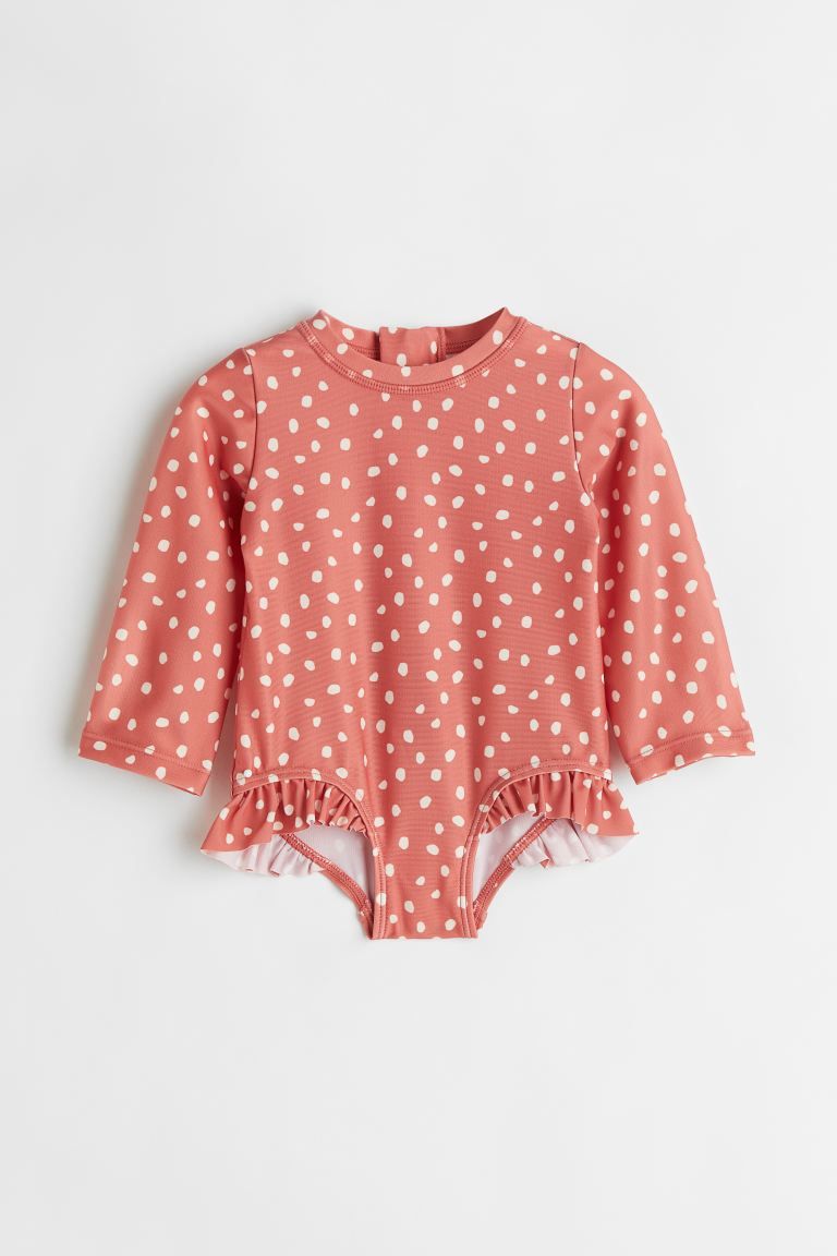 Long-sleeved swimsuit with flounce-trimmed leg openings. Low stand-up collar, zipper at back with... | H&M (US + CA)