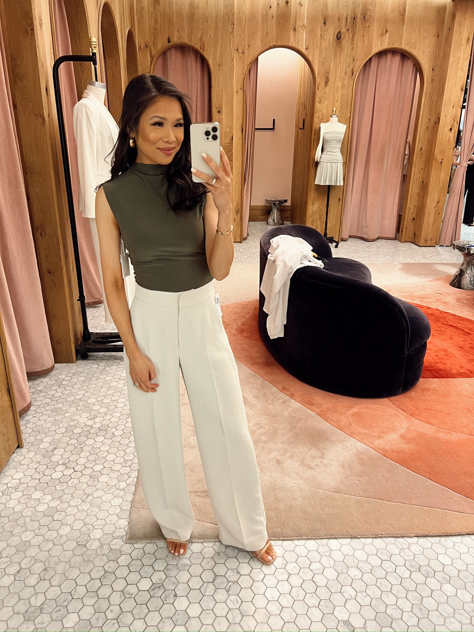 Smart casual workwear with cream pants paired with dark olive top. Great for year - round and can be dressed up with a blazer and pumps! Wearing size XXS in both the top and bottoms. Very comfy and chic! 

#LTKworkwear #LTKstyletip