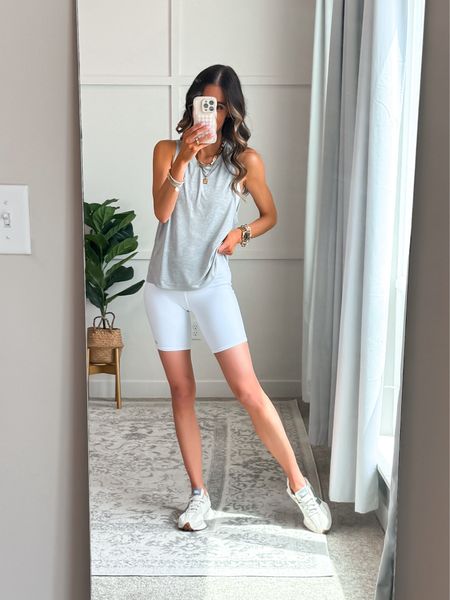⭐️ Next level comfortable! 

These tanks are super soft, lightweight and breathable. Great for working out or running errands. Come in long and crop style. I’m wearing the long. Fit true to size. 

Activewear | fitness outfit | running outfit | leggings outfit | biker shorts outfit | errands outfit | everyday outfit | casual outfit 

#LTKFindsUnder50 #LTKActive #LTKFitness