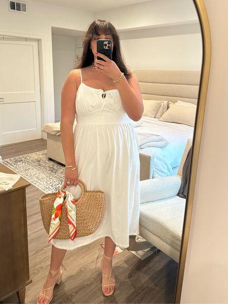 Loving this simple yet ethereal white dress for summer! It is so flattering and can be worn for so many different occasions. 

White dress, summer dress, old navy, straw bag, summer outfit inspo, mid size outfit inspo

#LTKunder100 #LTKcurves #LTKstyletip