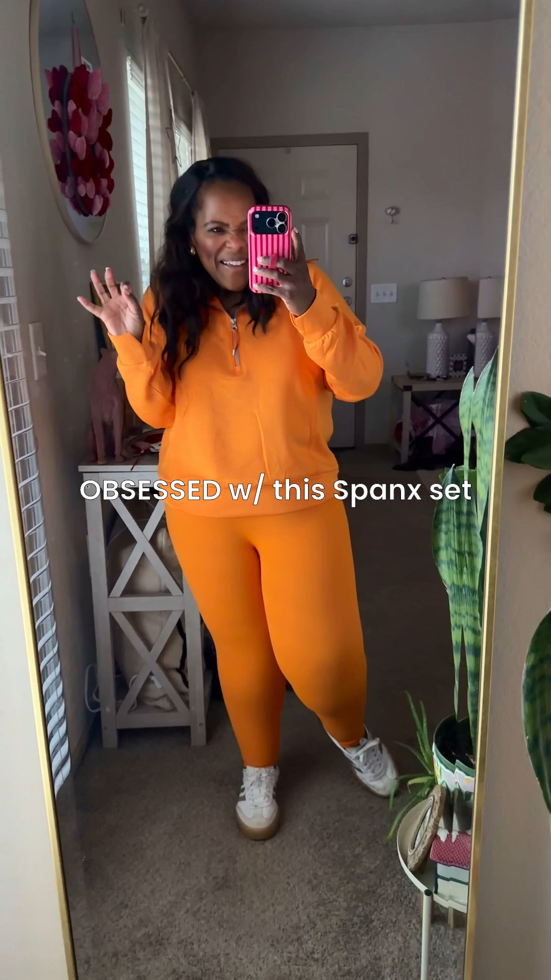 Obsessed with this gorgeous orange color 🍊 from Spanx! Wearing a large in the half zip and xl in the booty boosting leggings. 🧡🧡🧡  

#LTKfitnessgoals #LTKSaleAlert #LTKootd
