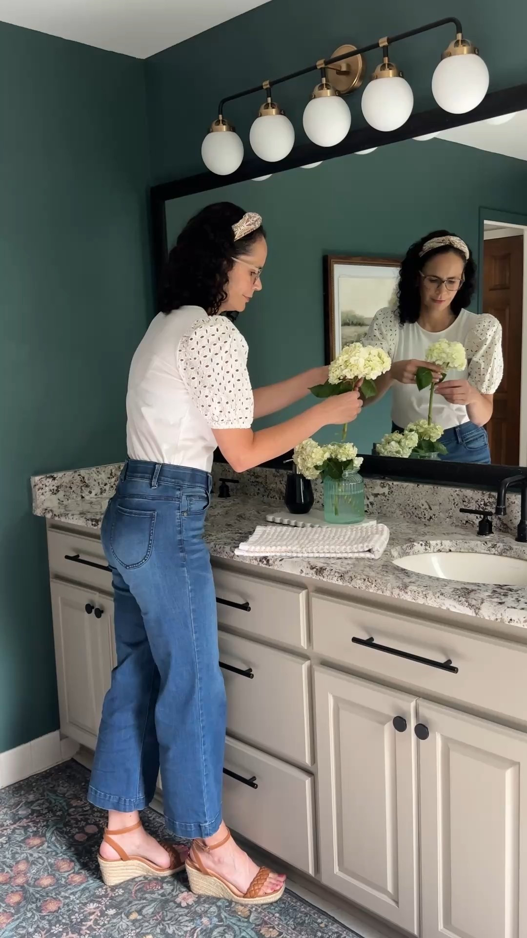 Moody green bathroom with neutral vanity.  Easy bathroom makeover with paint and accessories.

home decor | bathroom decor | bathroom design | color of the year | jeans | vanity light -| towels | faucet | hidden gem



#LTKOver40 #LTKFindsUnder50 #LTKHome