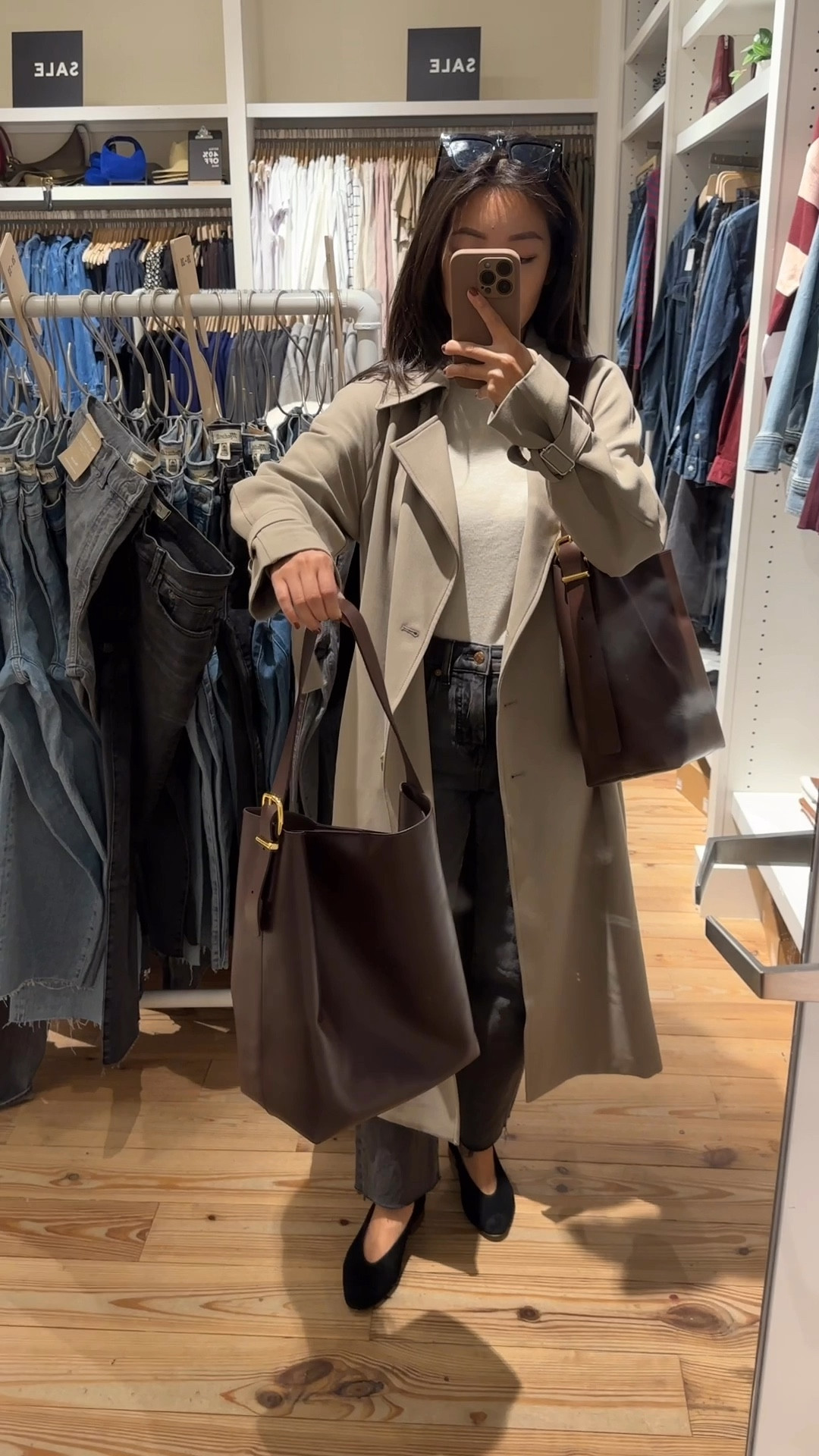 On sale: Madewell Essential Bucket bag full size vs. medium size. Lowest discount they’ve done for this style so far. 

Love this bag so much! Makes a very useful gift. The chocolate raisin color is beautiful. Has nice slouch to it sns I use the full size one regularly as my laptop / work bag. 

• Oak + Fort trench coat xxs - Use code JEANTRENCH for 20% off. very loose fit (runs big, hits past midi length on me at 5ft). The material has a nice weight and drapes well. Note that for returns, buyer covers cost of shipping fyi for this retailer 

 • Madewell 90’s straight crop jeans 24 (hems cut shorter, or buy petites but my size was sold out) - these are a great straight cut option that works well with booties, flats, and heels. 

• Sezane Matilda Ballet flats 5 worn with heel lifts

#LTKGiftGuide #LTKItBag #LTKCyberWeek