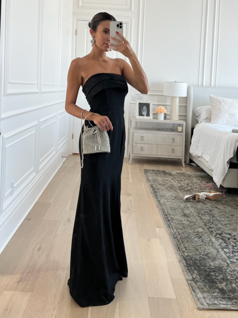 This long simple black simple strapless dress is so elegant and beautiful - perfect for holiday parties and winter weddings 🖤 I’m wearing size small. 
Use code: CHRISTINE20 for 20% off 🫶🏼

Wedding guest dress; Christmas party dress; holiday party dress; New Year’s Eve dress; formal black dress; formal party dress; dinner party dress; lulus; Christine Andrew 

#LTKwedding #LTKHoliday #LTKSeasonal