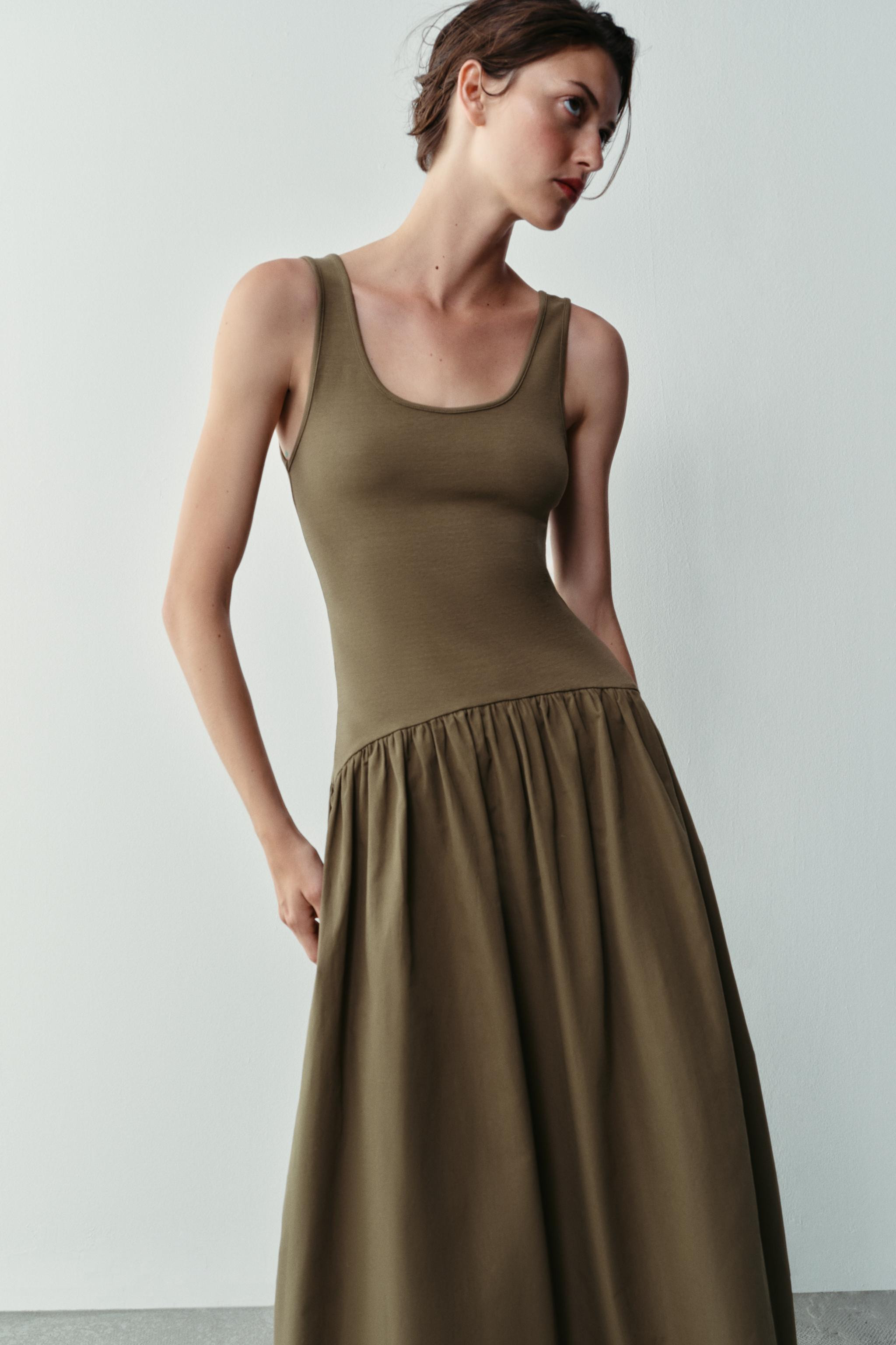 Cotton dress. Round neckline and wide straps. Features matching fabric appliqu\u00e9 detail. Flar... | Zara US