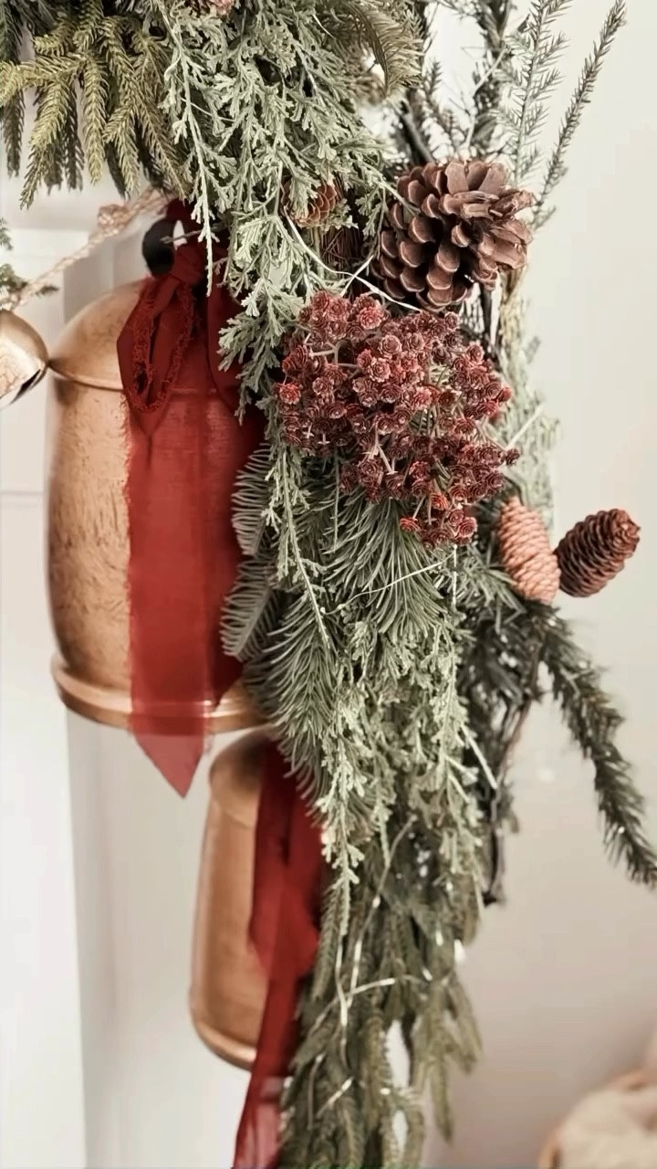 Christmas mantle 🤎🔔



#bells #vintage #christmasdecor #ribbon #MyTexasHouse #evergreen #wallart #wallsconces #candles #throwpillows #burgundy #garland #picks #stems #twinklelights

#LTKHome #LTKHoliday #LTKSeasonal

#LTKHoliday #LTKSeasonal #LTKHome