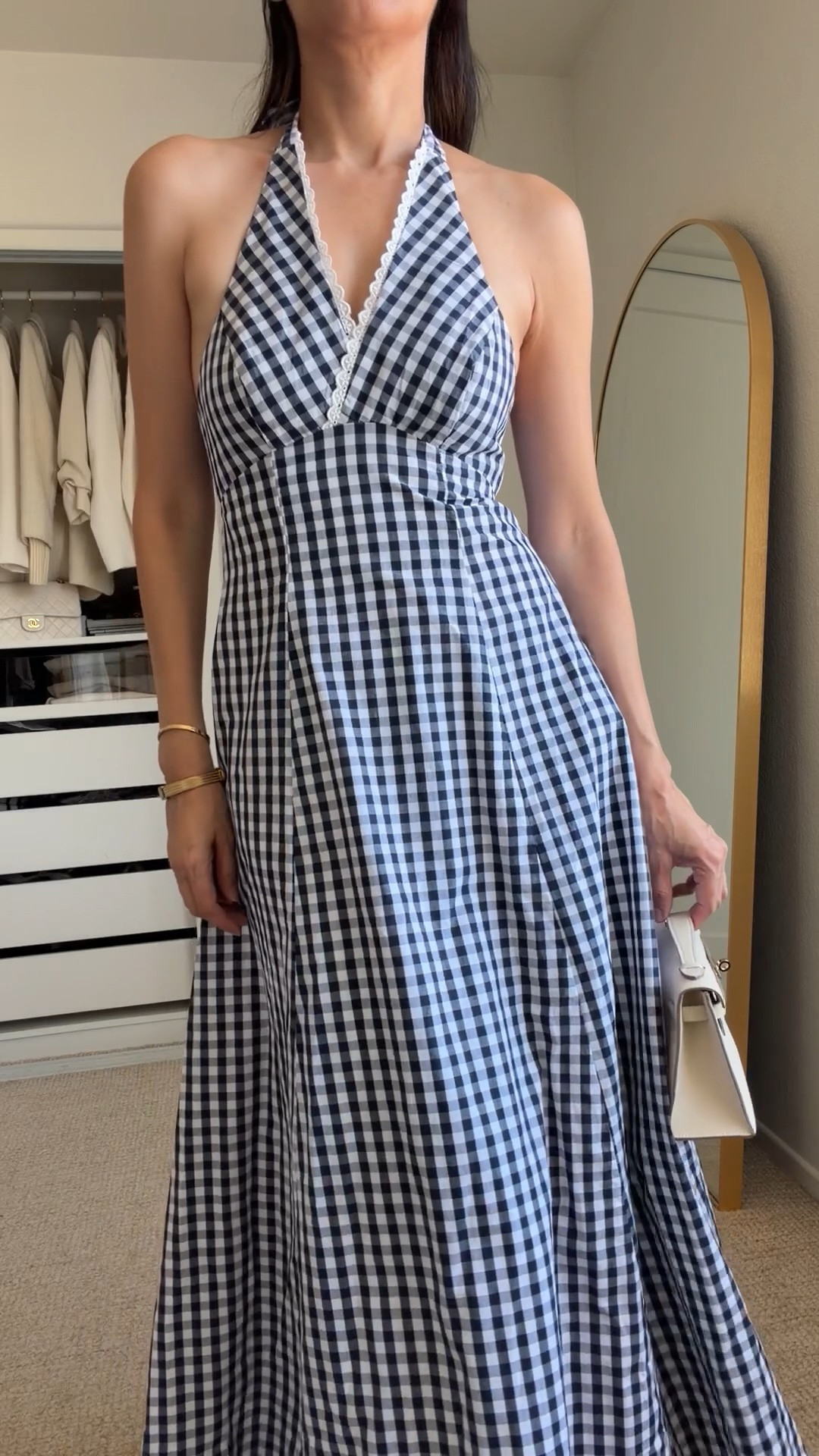 Anthropologie gingham halter midi dress 🤍 Such a beautiful 100% cotton dress! I love the classic navy and white gingham print, flattering halter neckline and flowy A-line midi silhouette. An easy dress for summer, vacation, brunch or casual days—and so cute styled with a trench or light jacket for transitioning into fall.

➡️ Wearing size XS — fits perfectly!

➡️ My Body dimensions
Bra: 32C (81 cm)
Waist: 26” (66 cm)
Hips: 38” (96.5 cm)
Height: 5’7” (170 cm)

Anthropologie dress | gingham dress | halter midi dress | cotton midi dress | navy and white dress | A-line dress | summer dress | vacation dress | transitional dress | Anthropologie finds | casual chic dress | dresses over 40 | dresses over 50

#AnthropologieDress #GinghamDress #MidiDress #LTKStyle

#LTKOver40 #LTKootd #LTKgrwm