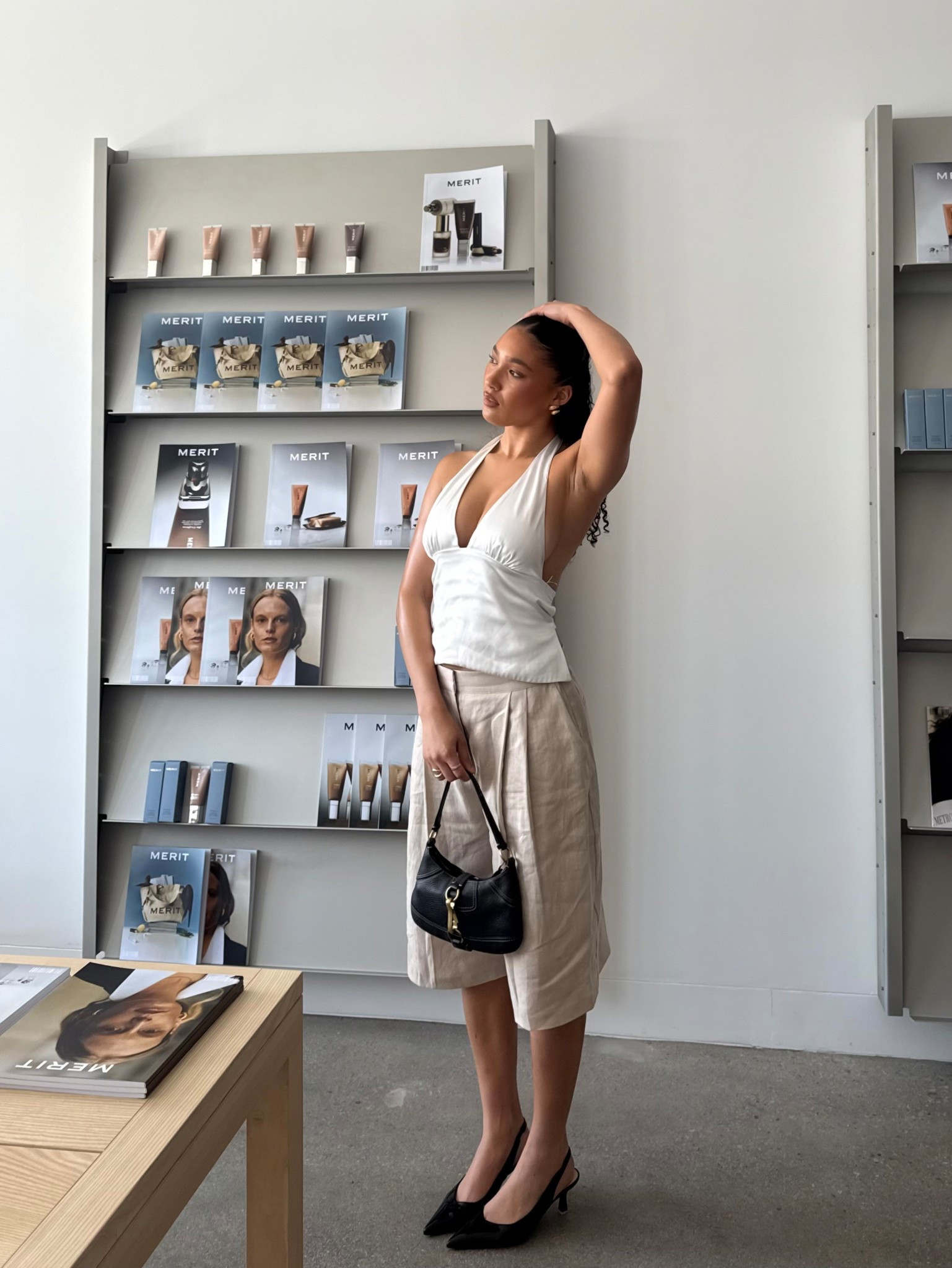 office inspired look with beige trouser shorts a satin white halter top and vintage black coach bag and black kitten heels 

#LTKStyleTip #LTKSummerEdit #LTKBeauty