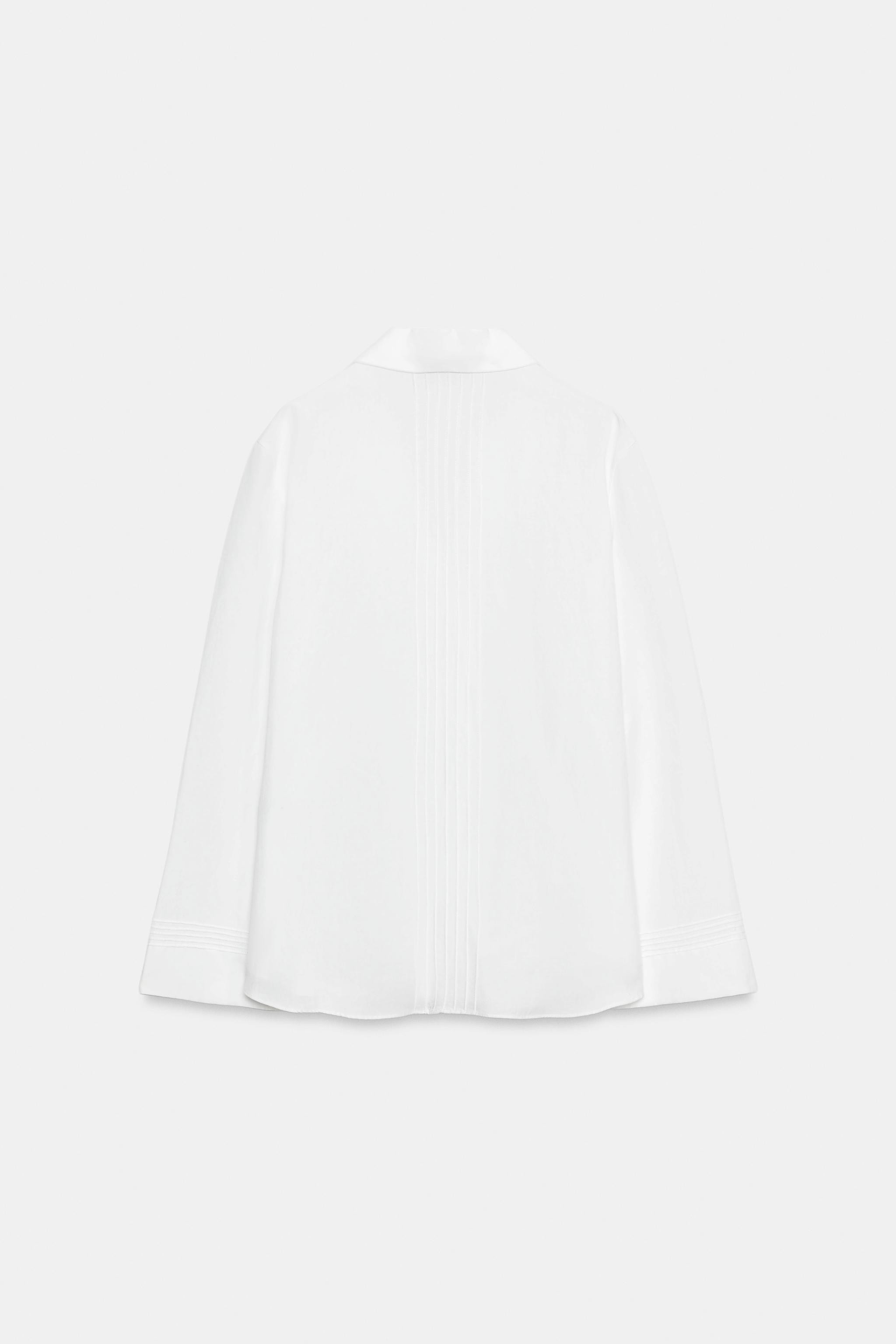 DescriptionContentsMeasurementsZARA WOMAN COLLECTIONShirt made from a lyocell and 25% linen blend... | Zara US
