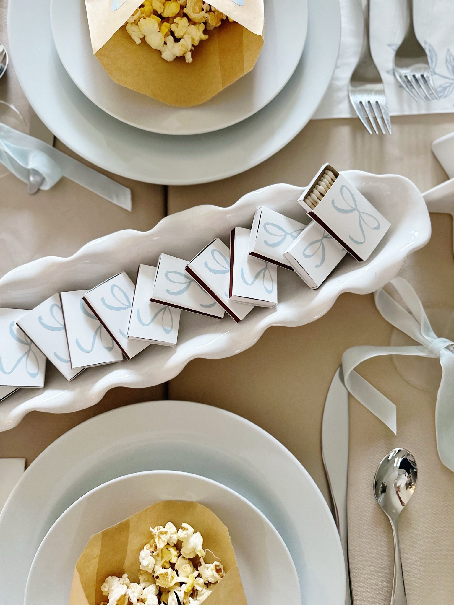 A simple party favor for any dinner party really not just a shower is a box of matches. These white tip, white box matches are perfect by themselves or to add a little flare to. I had always wanted a Cricut but was so intimidated by them and concern over if I could figure out how to use it. I decided to try the small Cricut Joy and I love it! It’s so easy to use and it’s now a workhorse for all my parties. For this engagement celebration the matches not only complimented the indoor firepits I had on the tables but it symbolized the bride finding her perfect match.  

Wedding shower, bridal shower, baby shower, winter wedding celebration 

#LTKparties #LTKhome #LTKwedding