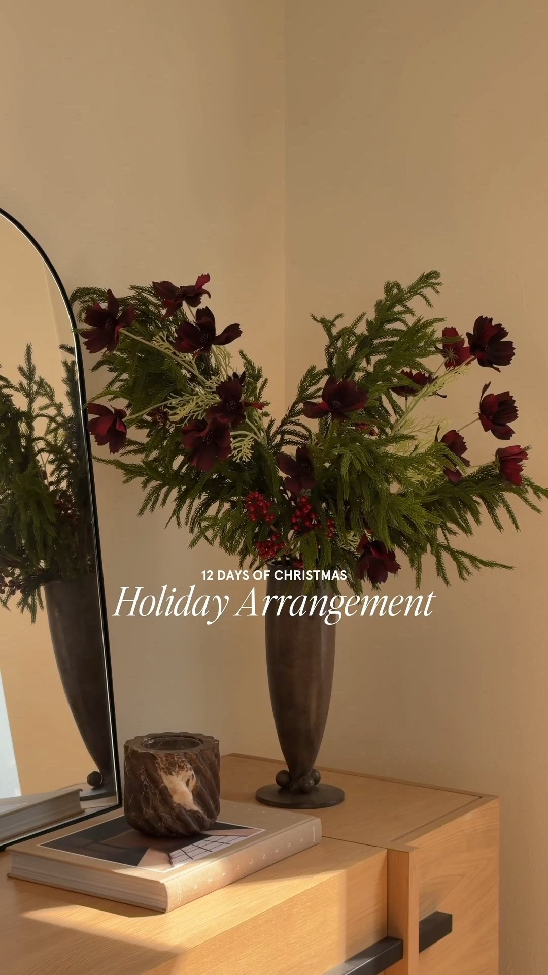 An easy but elevated christmas floral arrangement idea ❤️

- Burgundy Cosmos and vase from Crate & Barrel
- Norfolk pine and berry stems from Amazon

#LTKSeasonal #LTKHoliday #LTKHome
