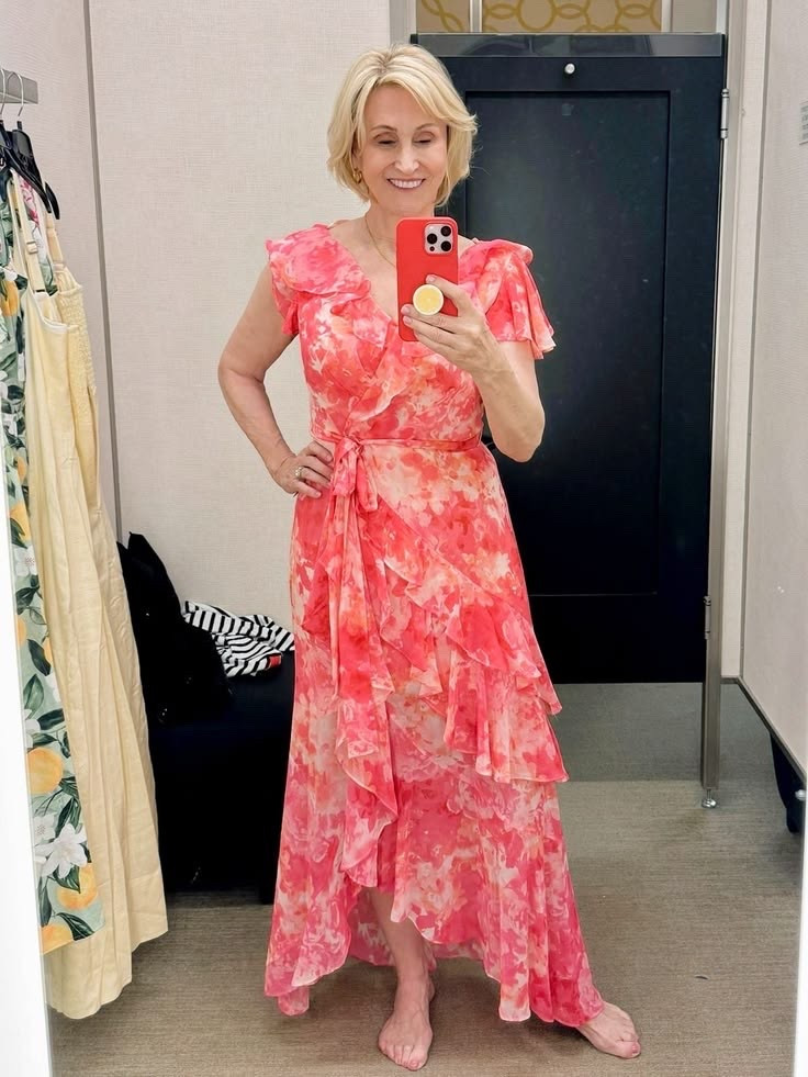 There’s something about warm coral and soft orange tones that just feels like golden hour in dress form. ☀️🧡

I’m absolutely loving this ruffle maxi dress—it has that effortless flowy feel that moves so beautifully, and the print feels vibrant without being overwhelming. The ruffle detailing adds just the right touch of femininity, making it one of those dresses that feels special the moment you put it on.

It’s perfect for those easy summer days where you want to feel comfortable but still a little dressed up—whether that’s lunch with friends, a holiday dinner, or just a slow day out and about.

#LTKSeasonal #LTKOver40 #LTKootd