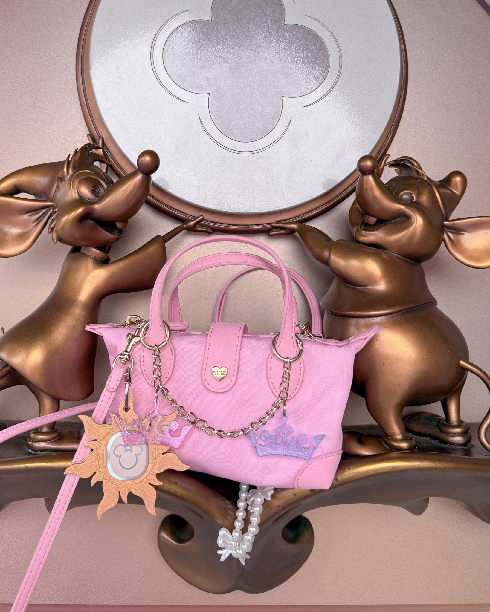 Cutest disney bag & magic band holder! 💗

#LTKSeasonal