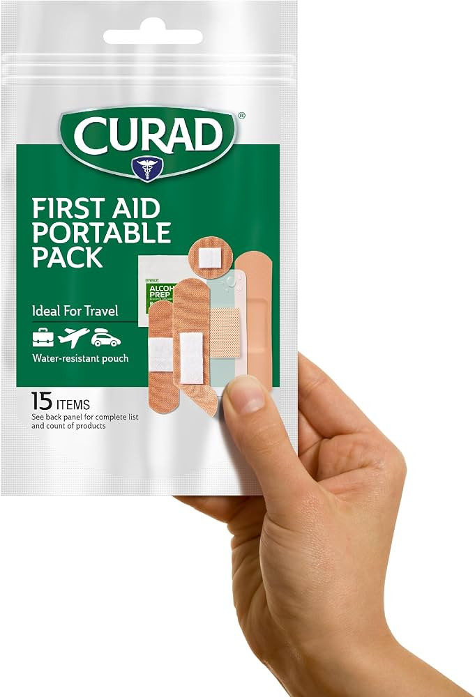 CURAD Frist Aid Portable Pack 15 - Count On-the-Go Essentials 12 Packs | Amazon (US)