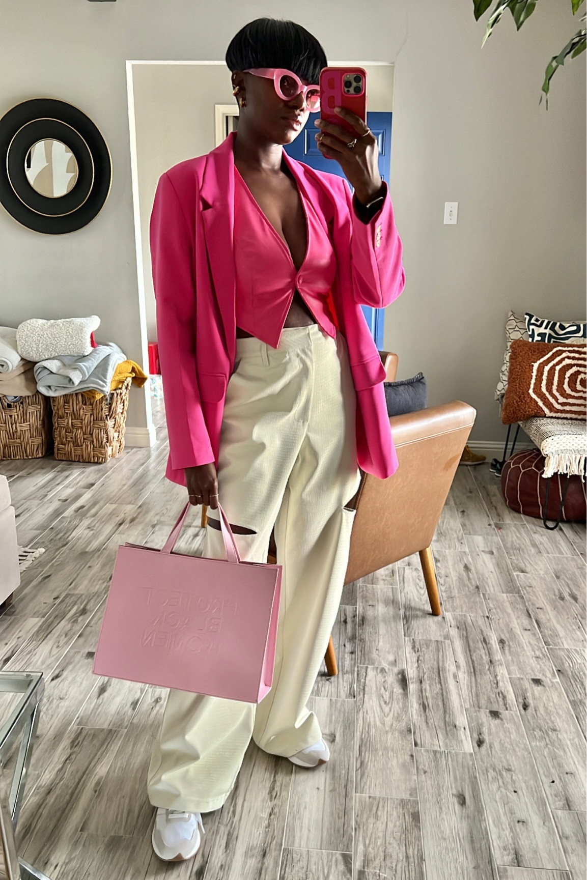 Oversized pink blazer, pink halter vest, white faux leather cut out pants, new balance 237 sneakers  

#LTKunder100 #LTKshoecrush