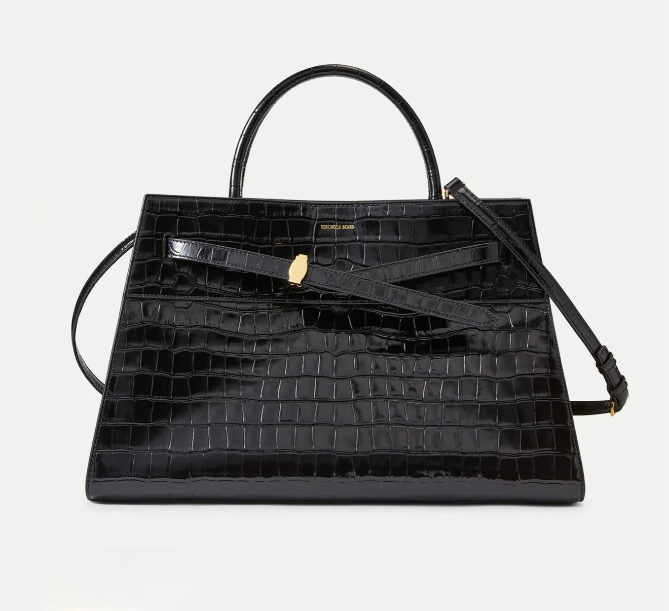Large Veronica Beard Dash Bag
Black Croc-Embossed Leather Belted Handbag

A roomier version of the original's sculptural shape, the aptly named Dash is a go-anywhere bag that takes you from work to weekends. Crafted from black croc-embossed leather with an adjustable belted strap

#LTKWorkwear #LTKSeasonal #LTKTravel