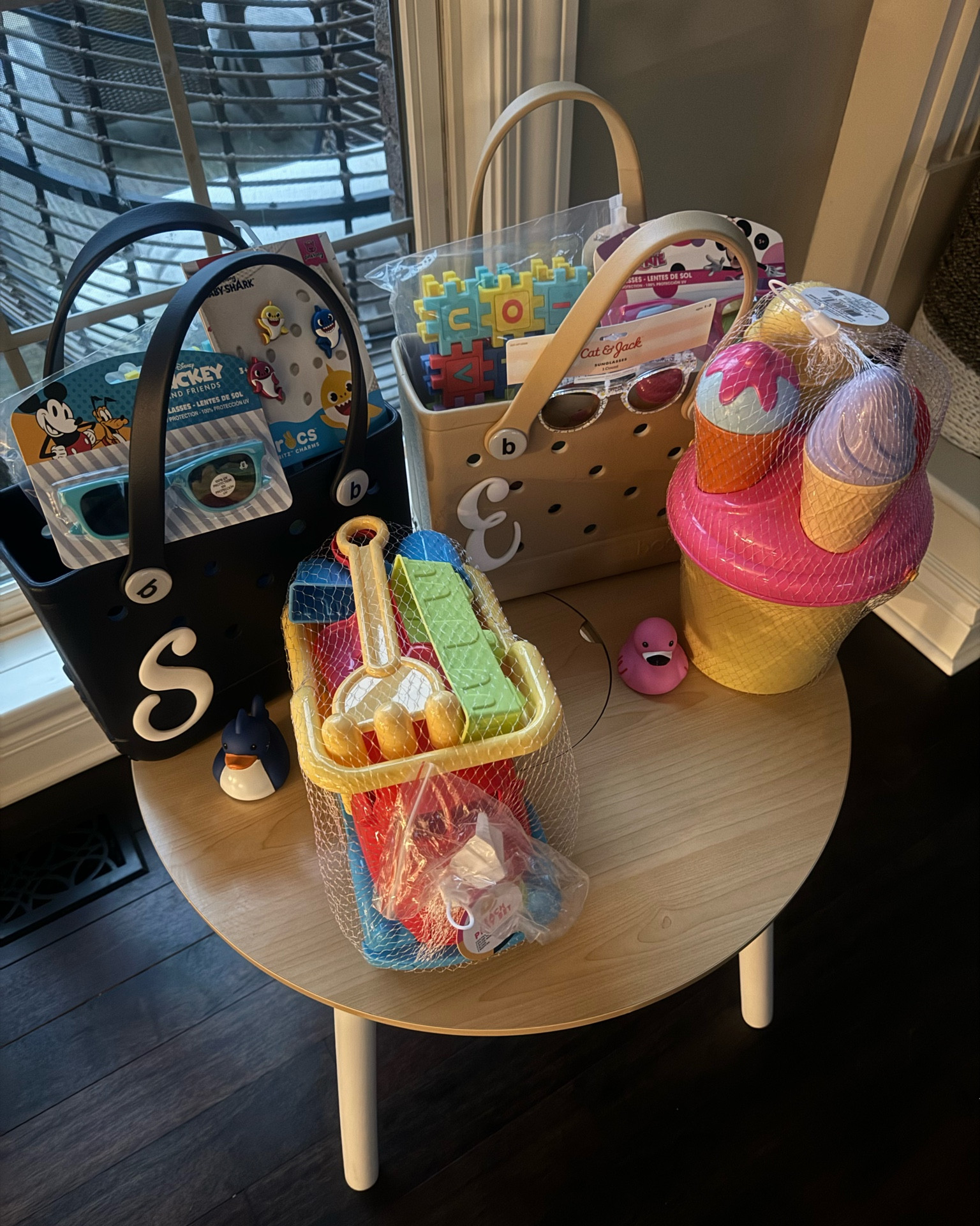 Kids’ beach bag gift idea 💡 These bitty bogg bags are adorable 🥰 Personalized with some initial jibbitz and they each got sunnies! 

Toddler gift ideas. Toddler gifts. Kids presents. Amazon finds. 

#LTKkids #LTKtravel