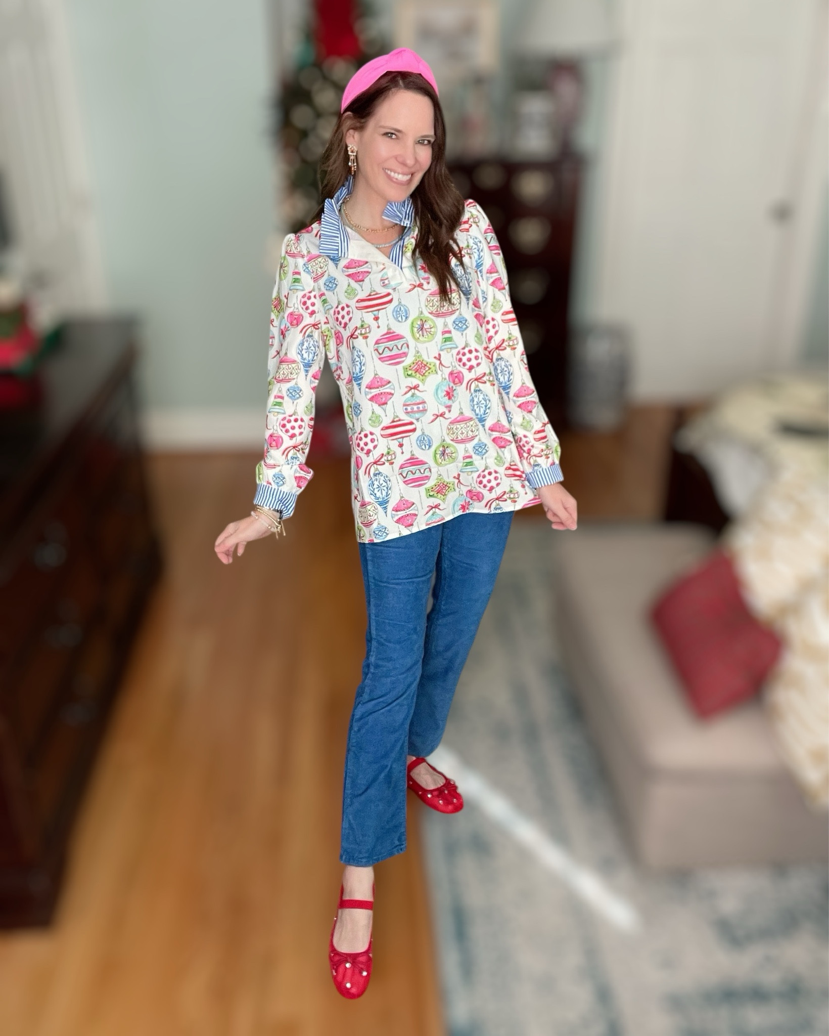 Festive Ornament Blouse Holiday Outfit 🎄💗

This cheerful Christmas blouse is SO fun for the holidays — bright, colorful, and covered in the cutest ornament print! I layered it over a blue striped button-down for that preppy pop, added my favorite pink headband, and paired it with soft, comfy corduroy pants for the perfect winter texture. The red Mary Jane flats pull everything together for the sweetest festive look! Such an easy, affordable, and cheerful holiday outfit you can wear to school events, cookie swaps, Christmas shopping, or casual holiday parties. 🎄💗✨

christmas ornament blouse, shein ornament print, holiday blouse outfit, colorful christmas outfit, pink headband outfit, preppy holiday look, affordable christmas fashion, festive sweater alternative, holiday layering ideas, winter corduroy pants outfit, corduroy pants winter style, gift ideas, bracelet stack, stocking stuffers, Black Friday, cyber Monday 

#LTKCyberWeek #LTKGiftGuide #LTKHoliday