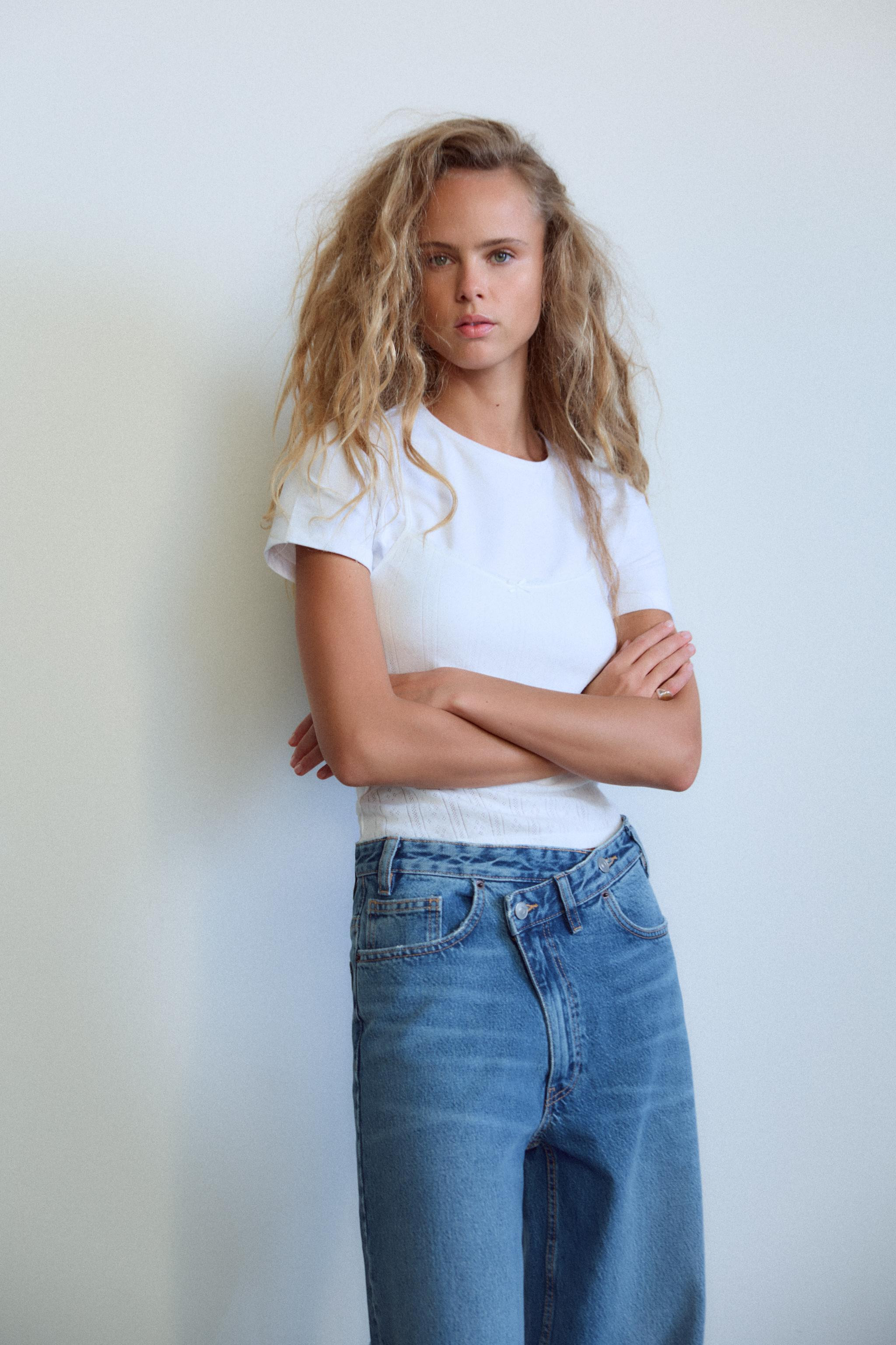 HIGH WAIST - WIDE LEG - FULL LENGTHFive pocket jeans with a high waist. Extra long wide legs. Asy... | Zara US