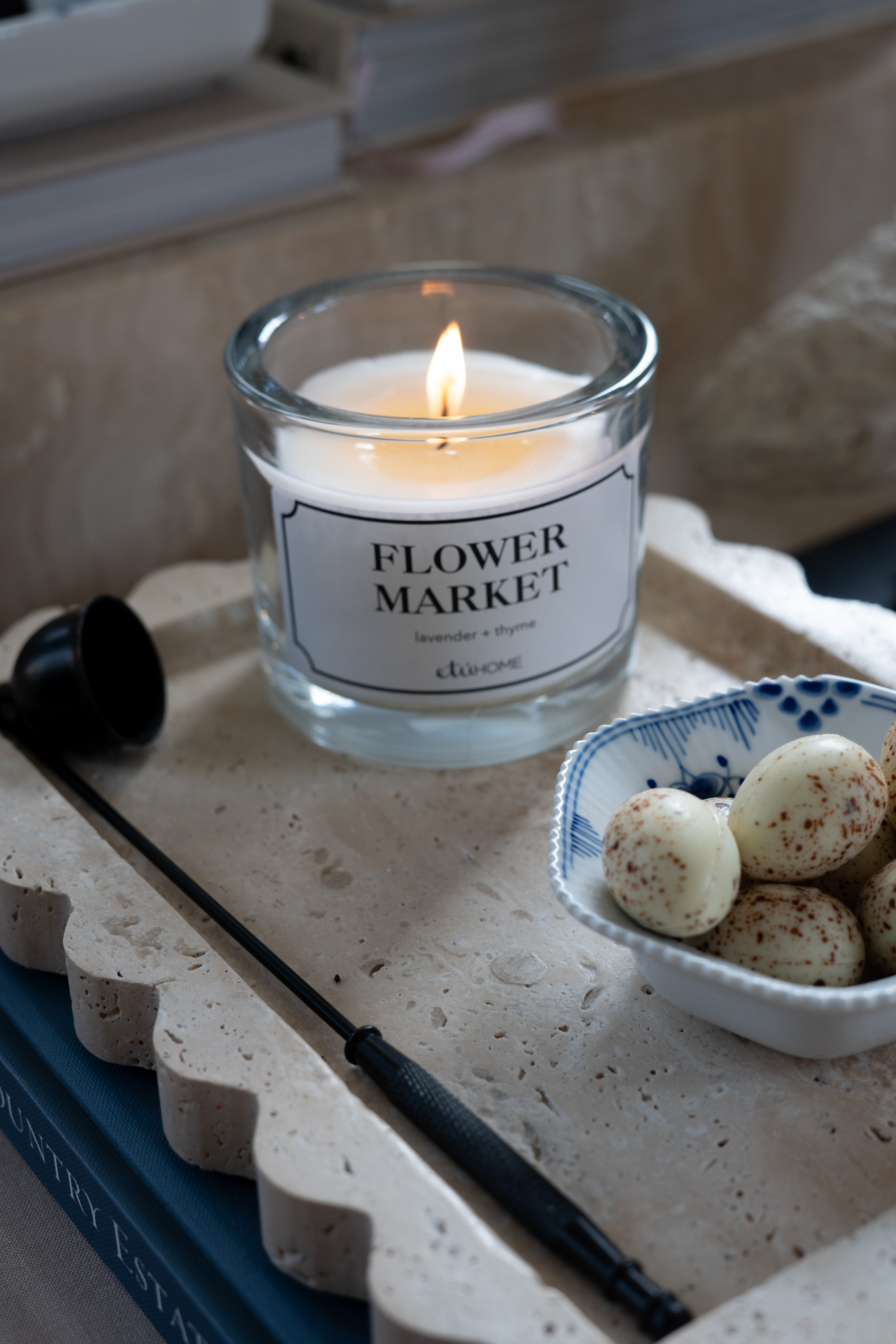 You guys this little styling moment is everything. A glowing candle, marble tray, stacked home decor books, and the cutest little bowl of treats make this feel so cozy and inviting. I cannot get enough of these soft, layered neutral home decor vibes. 

 #LTKSpringSale #LTKSeasonal #LTKHome
