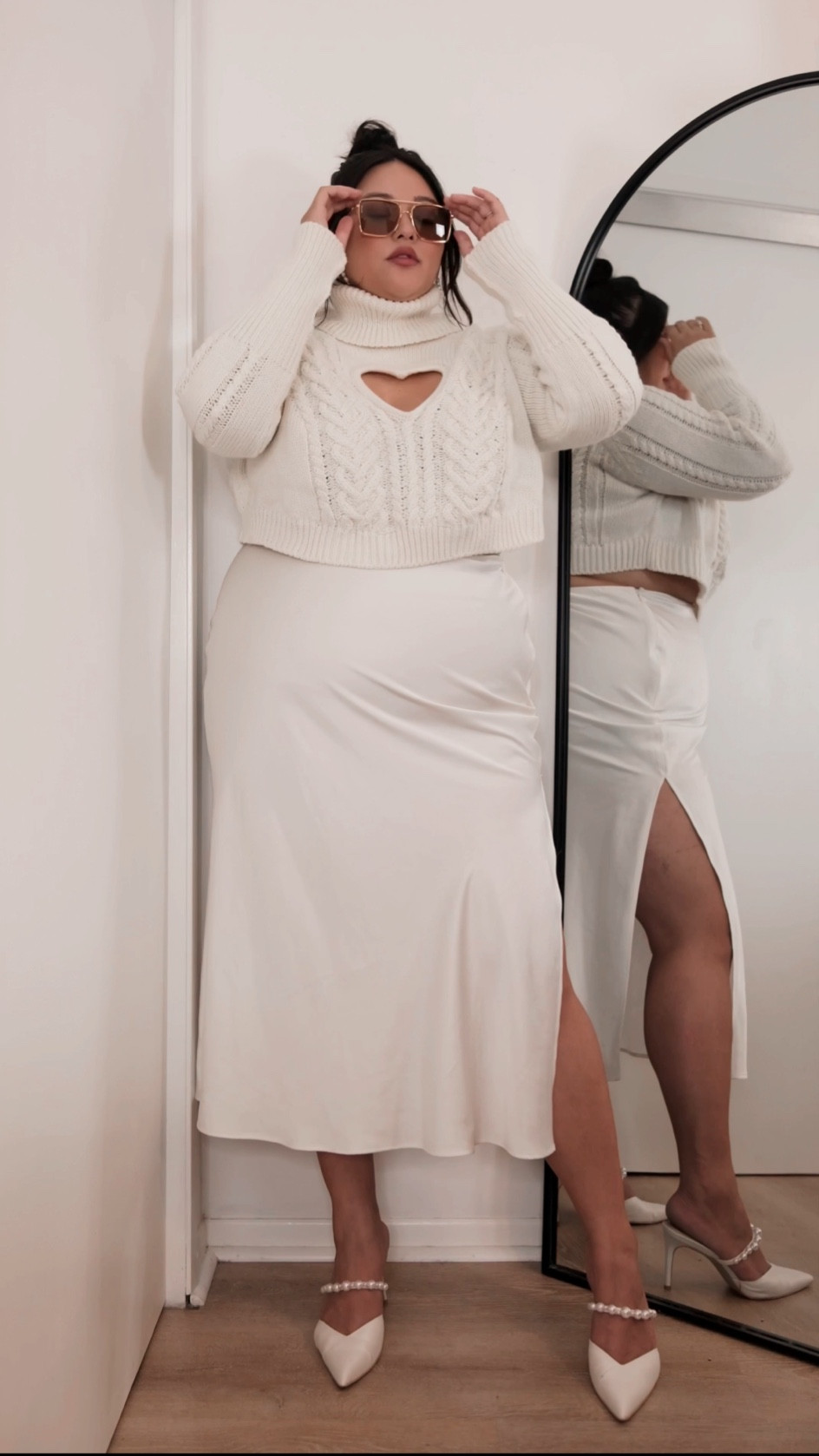 Look 4 of Fall/Winter Fits | Winter whites 🤍 

Outfit Details:
For Love and Lemons Vera Cropped Cut Out Sweater
Abercrombie satin skirt
Lulus Sail Away With Me Earrings
Dolce Vita Kanika Heels
Otra Velda Sunglasses

#falloutfitinspo #plussizeoutfitideas #plussizestyle #falltowinter #falltrends #wintertrends

#LTKHoliday #LTKstyletip #LTKplussize