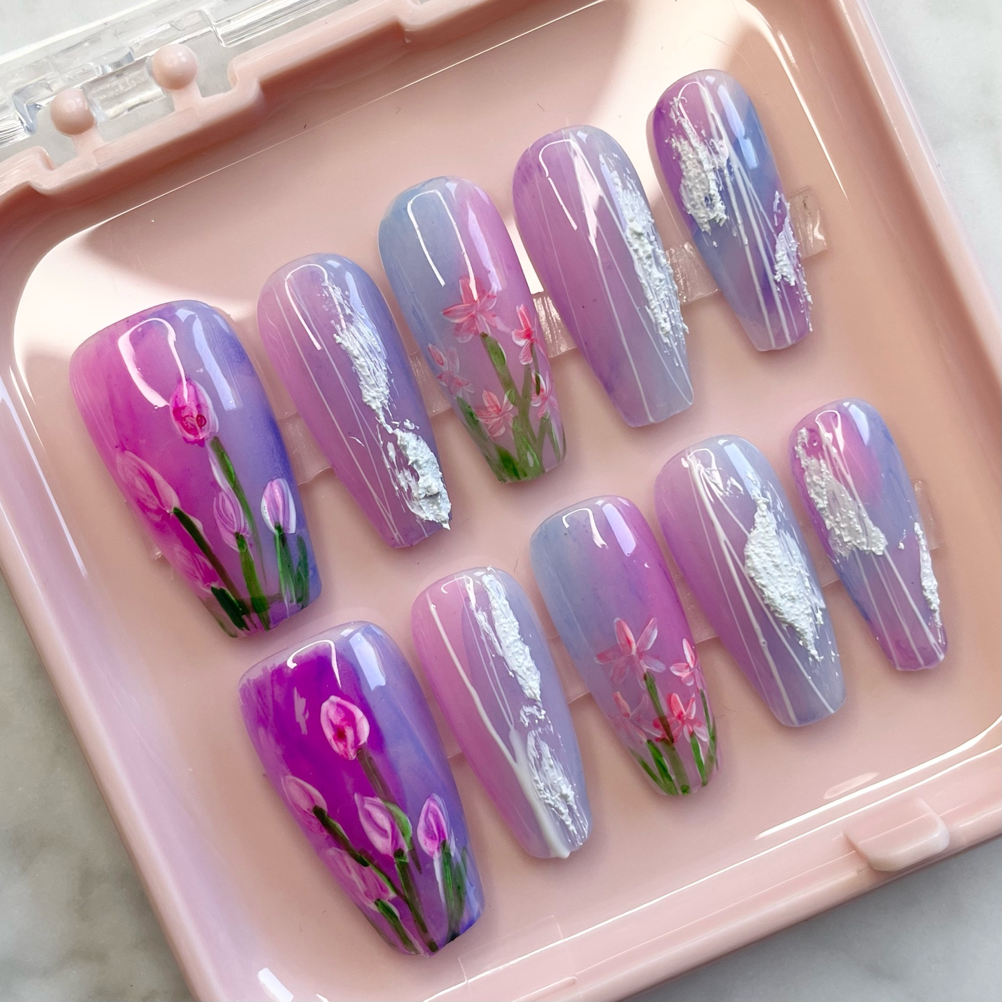 Spring nails, press on nails, nails with flowers, purple nails

#LTKFindsUnder50 #LTKBeauty #LTKSummerSales