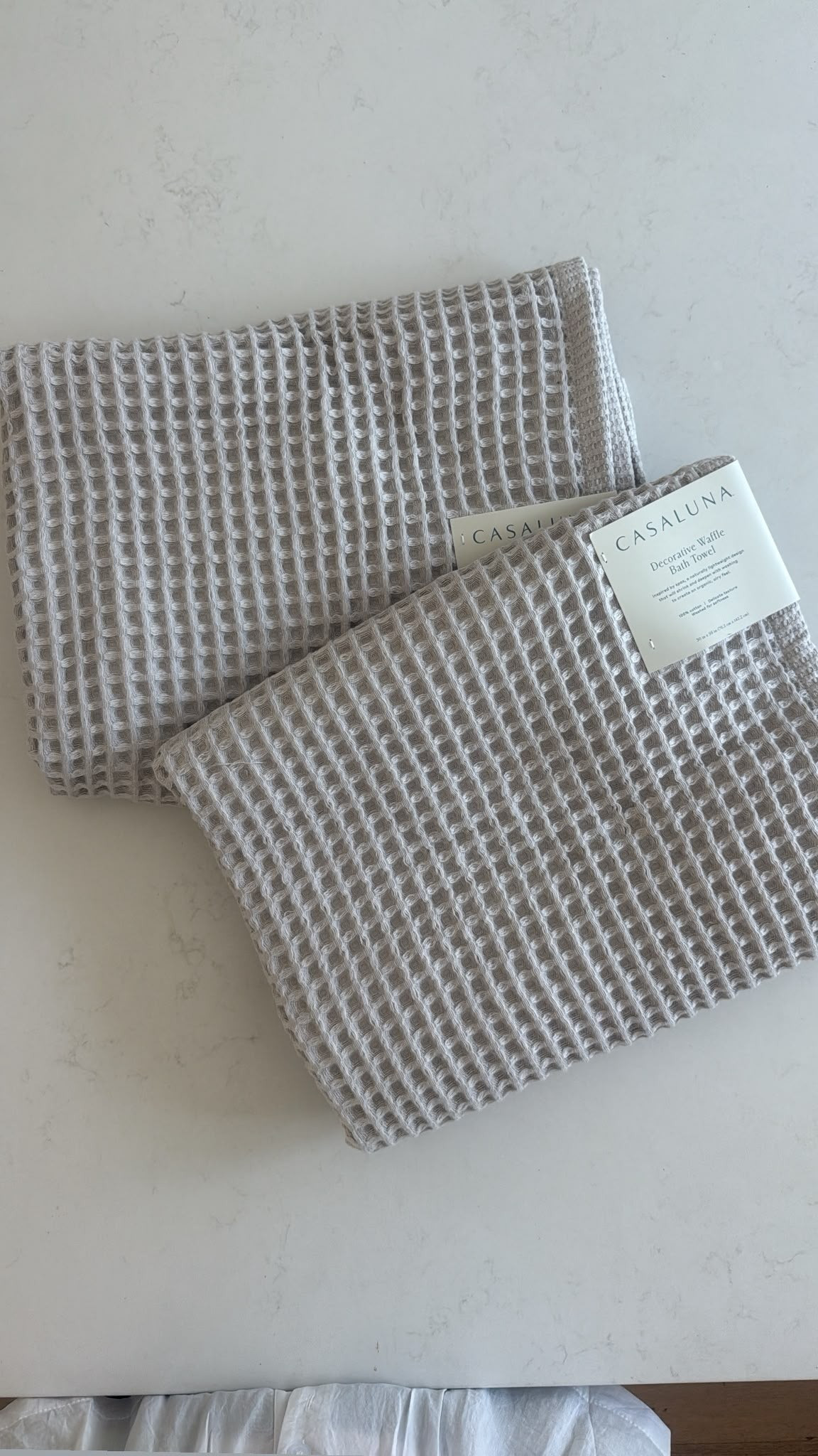 I love the waffle texture on these towel. Its so good I just ordered another! Comes in several colors and comes with a loop to put it on a hook.  

 #LTKdayinmylife #LTKHome
